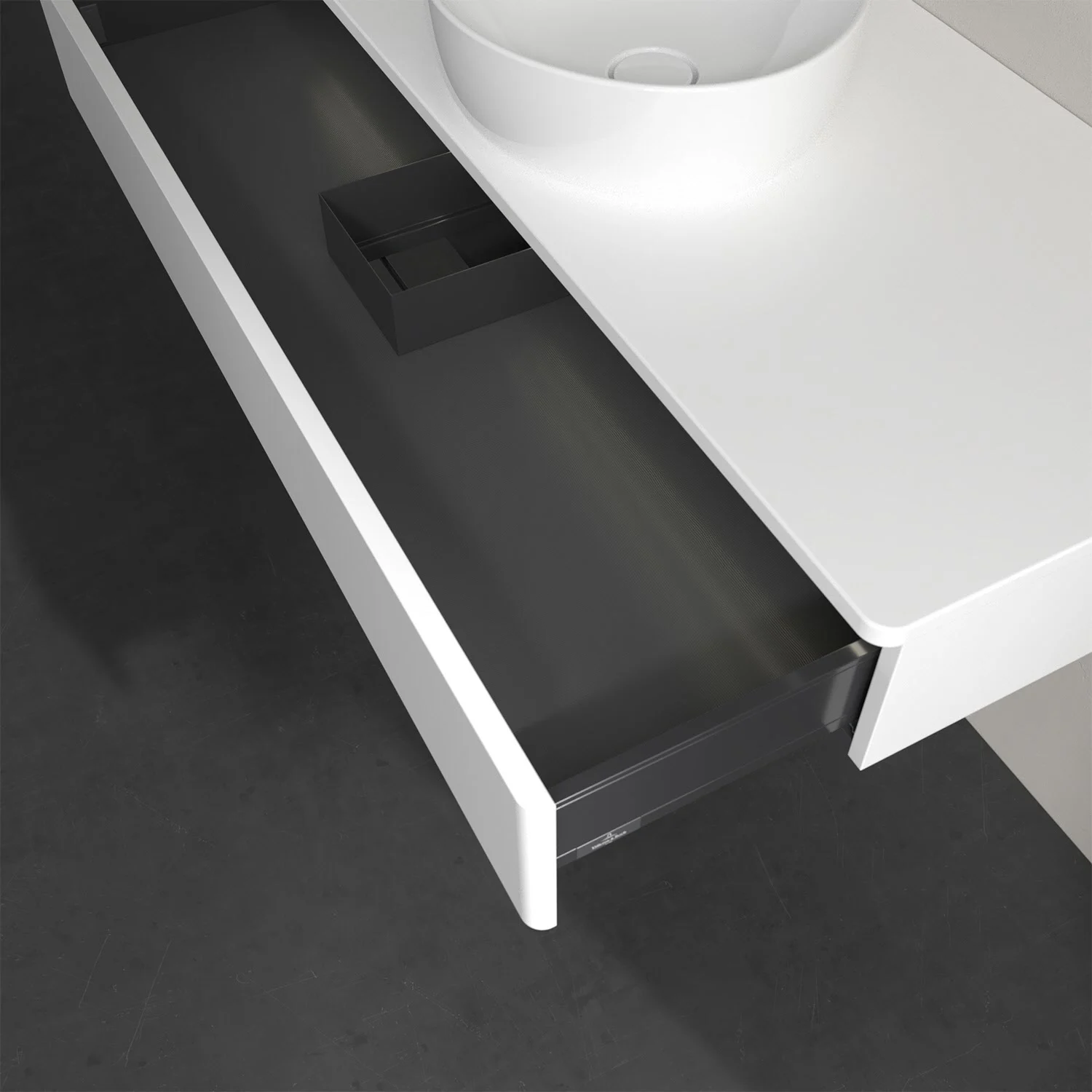 Biały zlew z otwartą szufladą z bliska, Villeroy & Boch