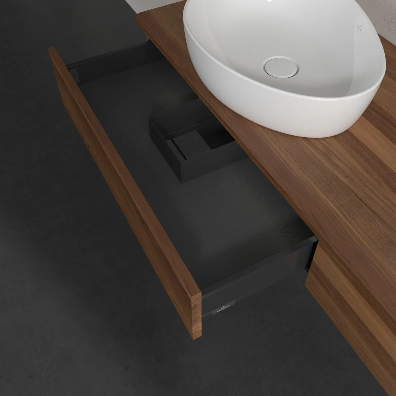 Otwarta szuflada pod ciemną drewnianą umywalką, Villeroy & Boch