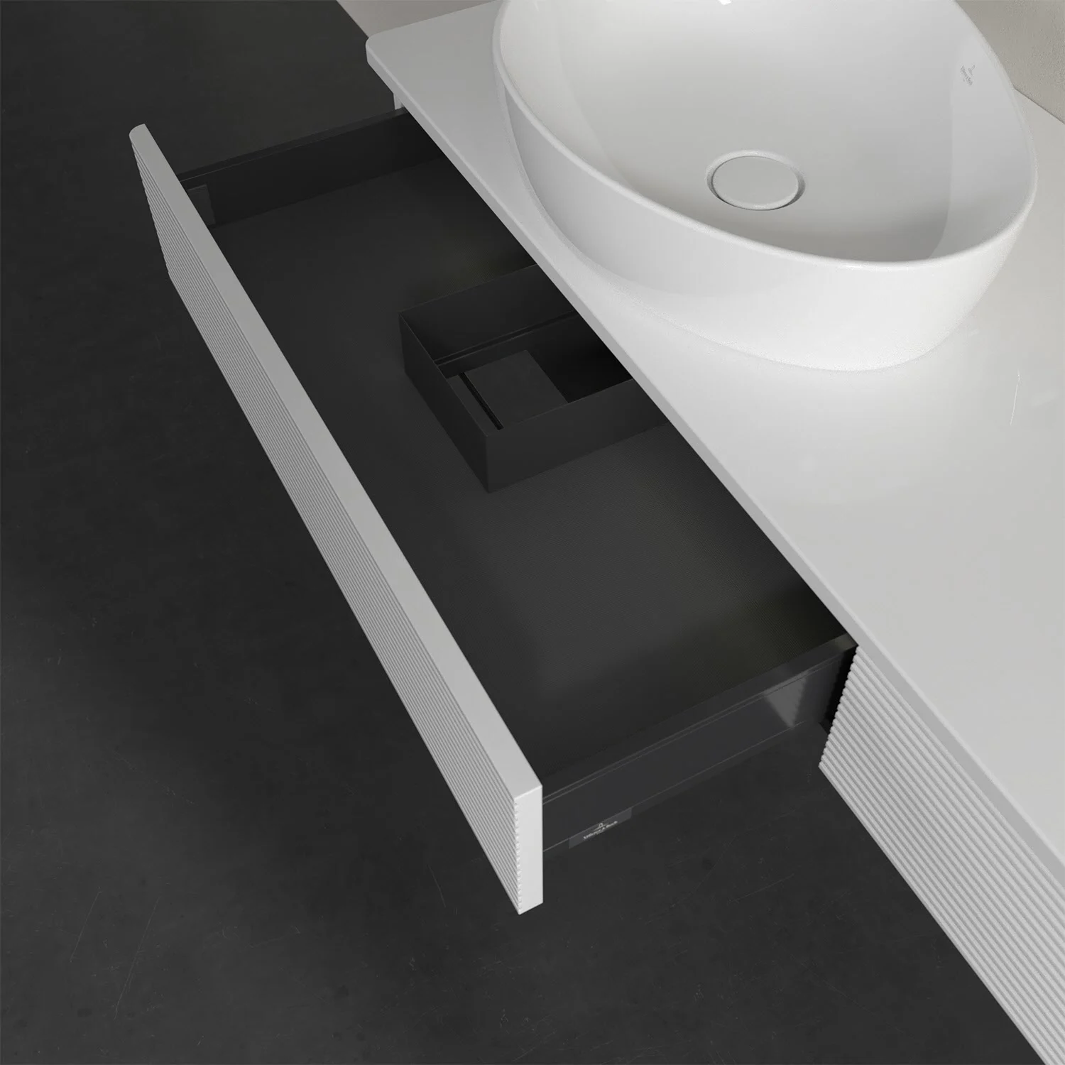 Umywalka z białą powierzchnią i otwartą szufladą, Villeroy & Boch