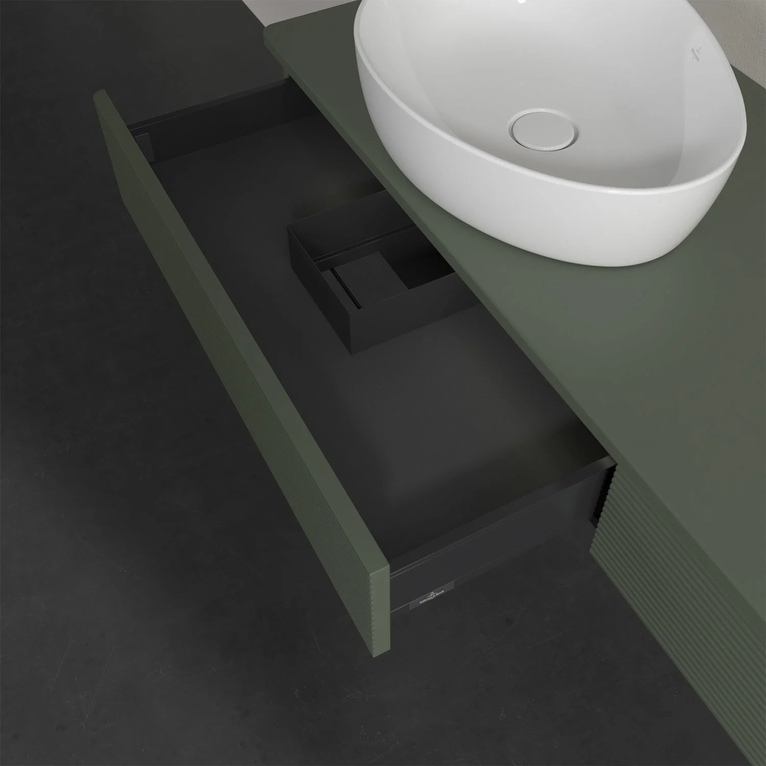 Otwarta szuflada pod zieloną umywalką, Villeroy & Boch