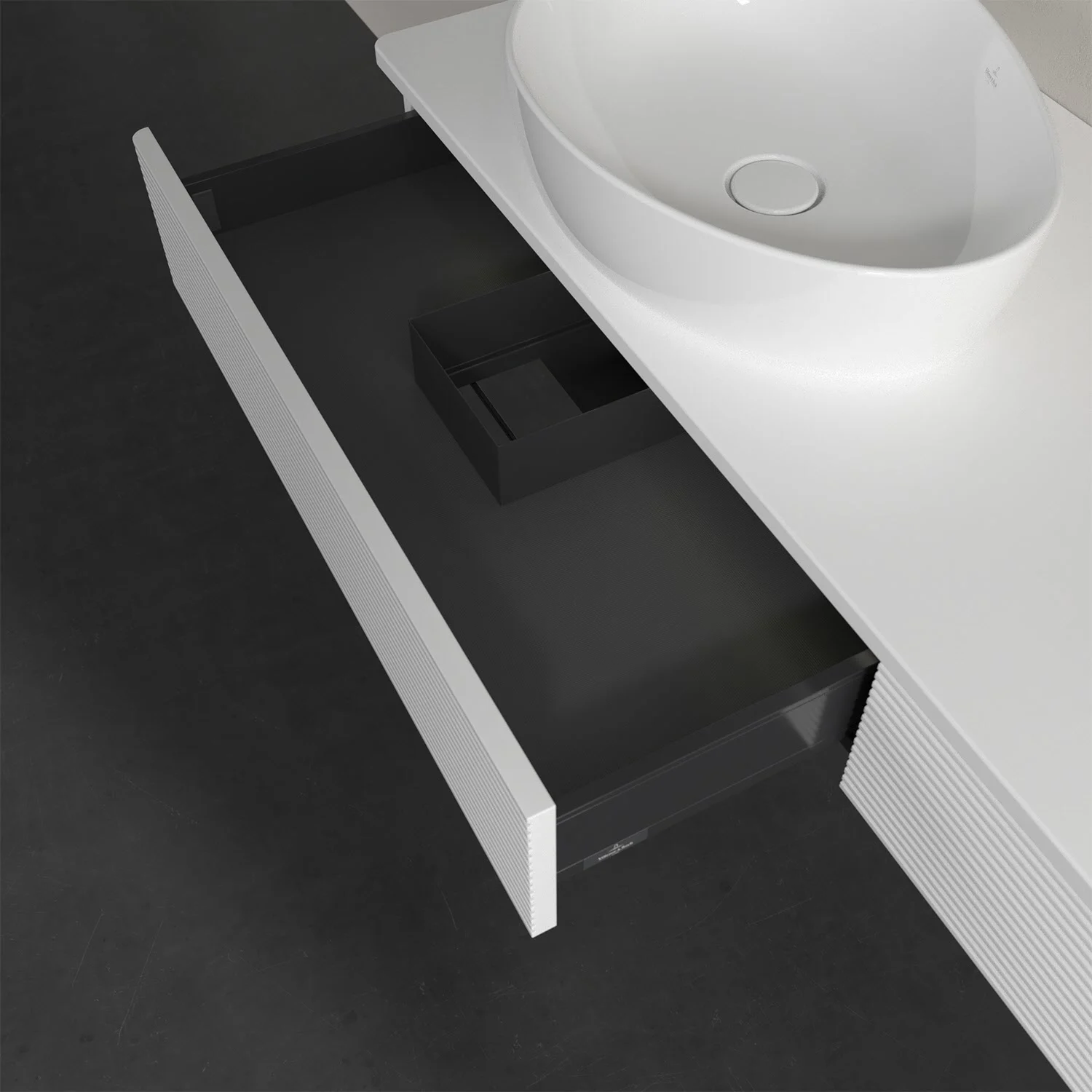 Otwarta szuflada pod białą umywalką, Villeroy & Boch