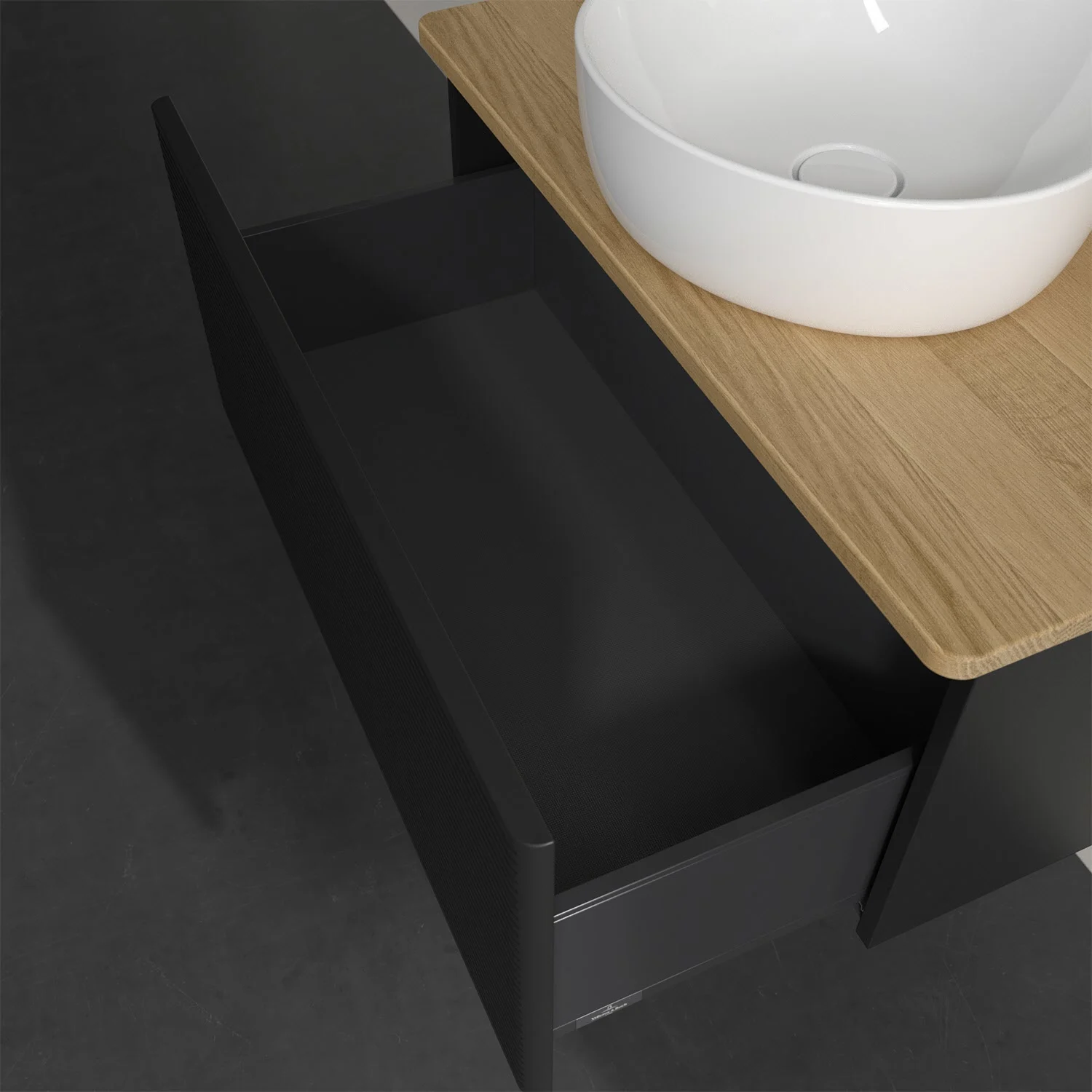 Czarna szafka pod umywalkę z otwartą szufladą, Villeroy & Boch