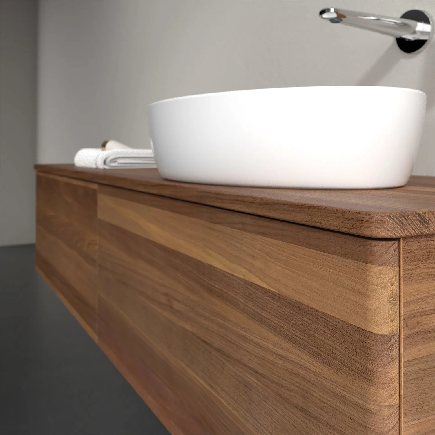 Ciemne drewniane meble łazienkowe z białą umywalką z bliska, Villeroy & Boch