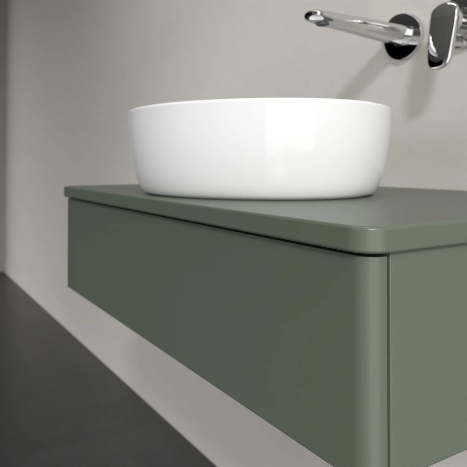 Zielona umywalka z baterią ścienną w łazience, Villeroy & Boch