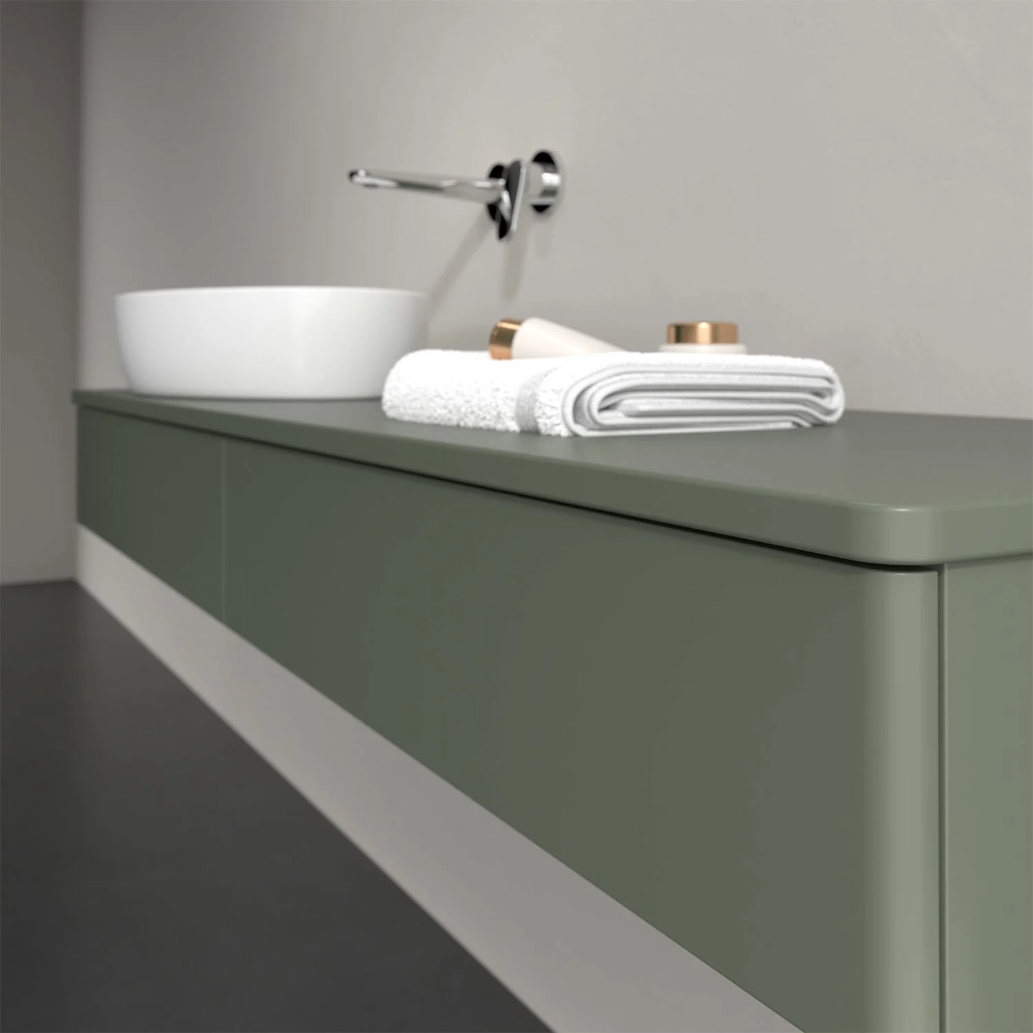Zielone meble łazienkowe z umywalką i ręcznikami, Villeroy & Boch