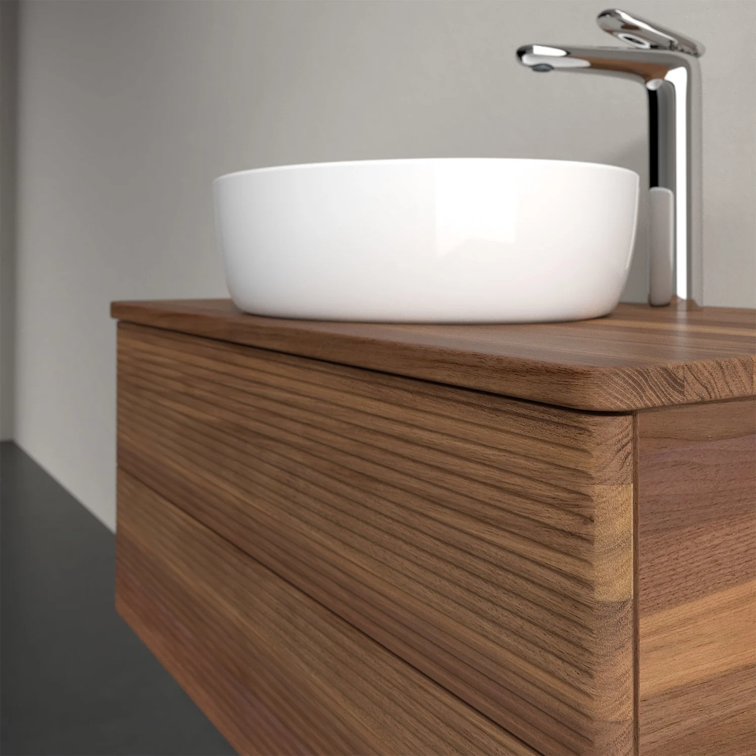 Zbliżenie na umywalkę z ciemną drewnianą powierzchnią, Villeroy & Boch