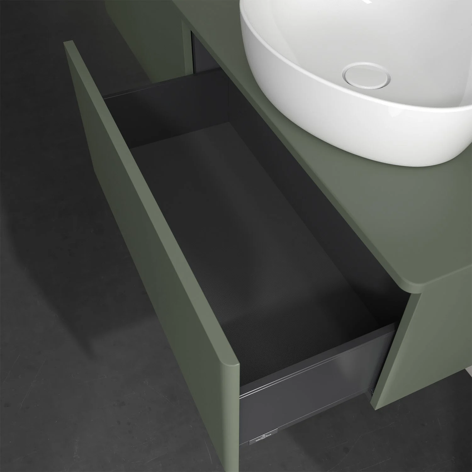 Otwarta szuflada pod zieloną umywalką, Villeroy & Boch