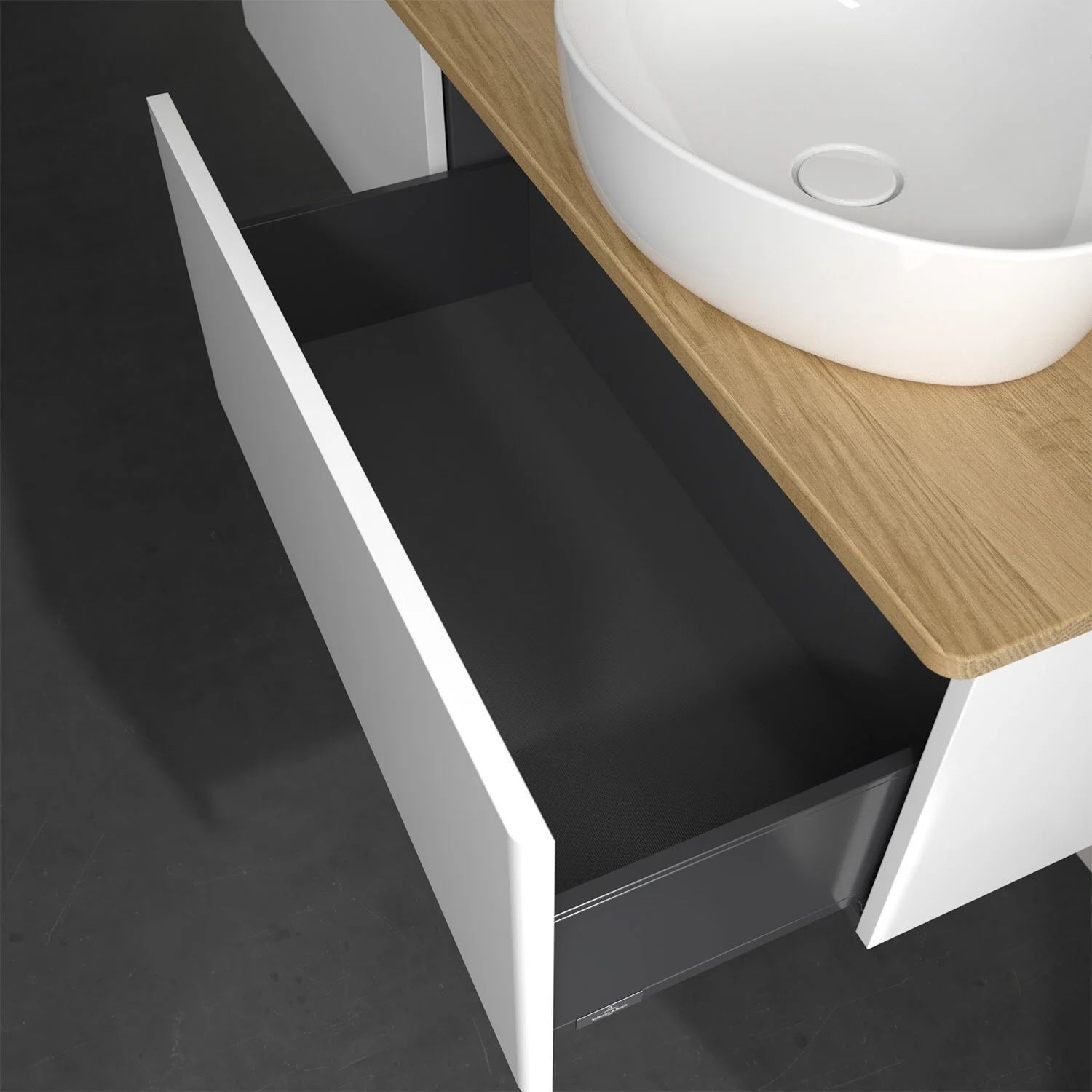 Otwarta szuflada pod białą umywalką z góry, Villeroy & Boch