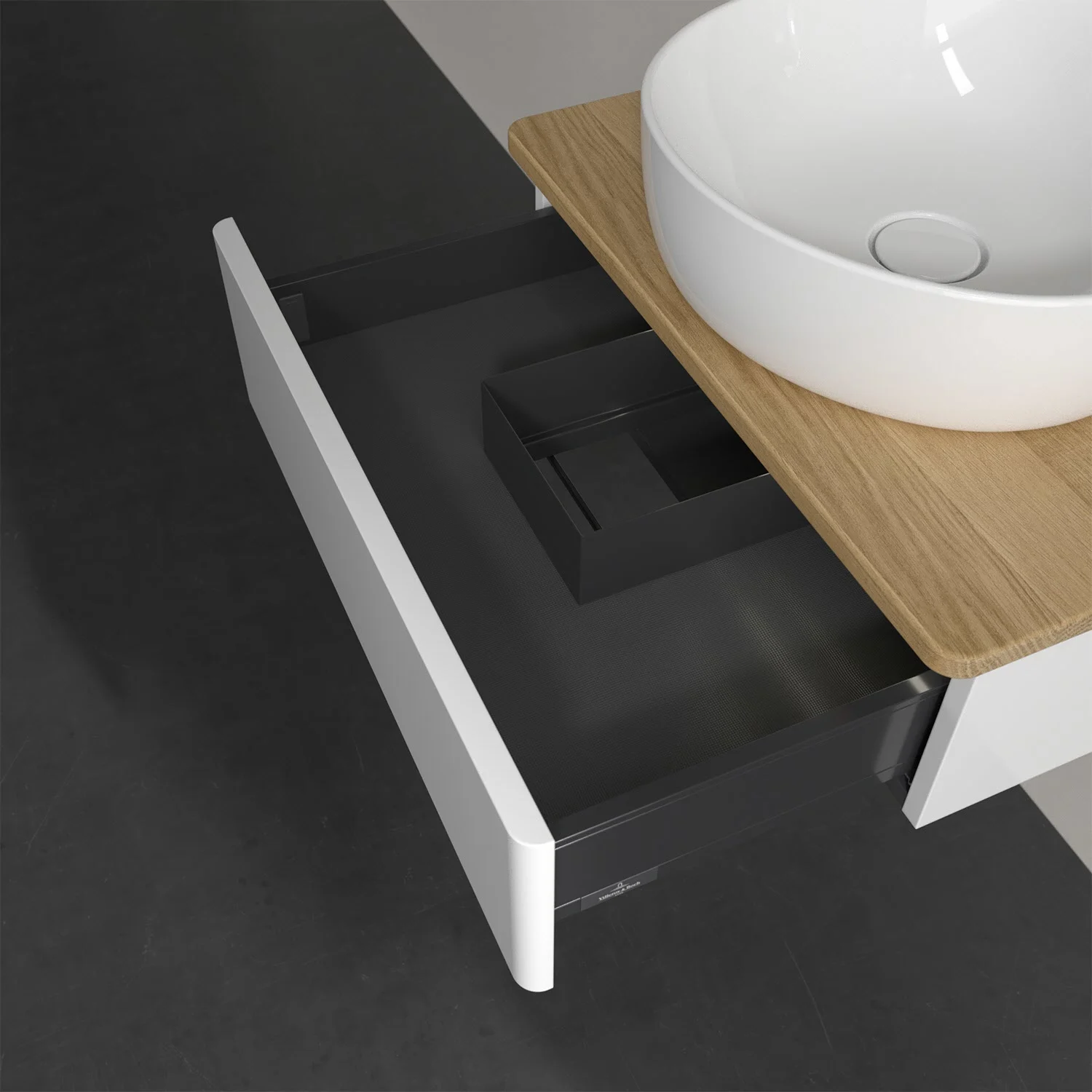 Otwarta szuflada pod białą umywalką, Villeroy & Boch
