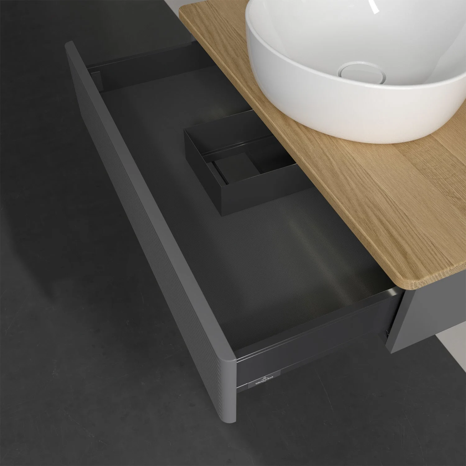 Otwarta szuflada pod umywalką z szarą szafką, Villeroy & Boch