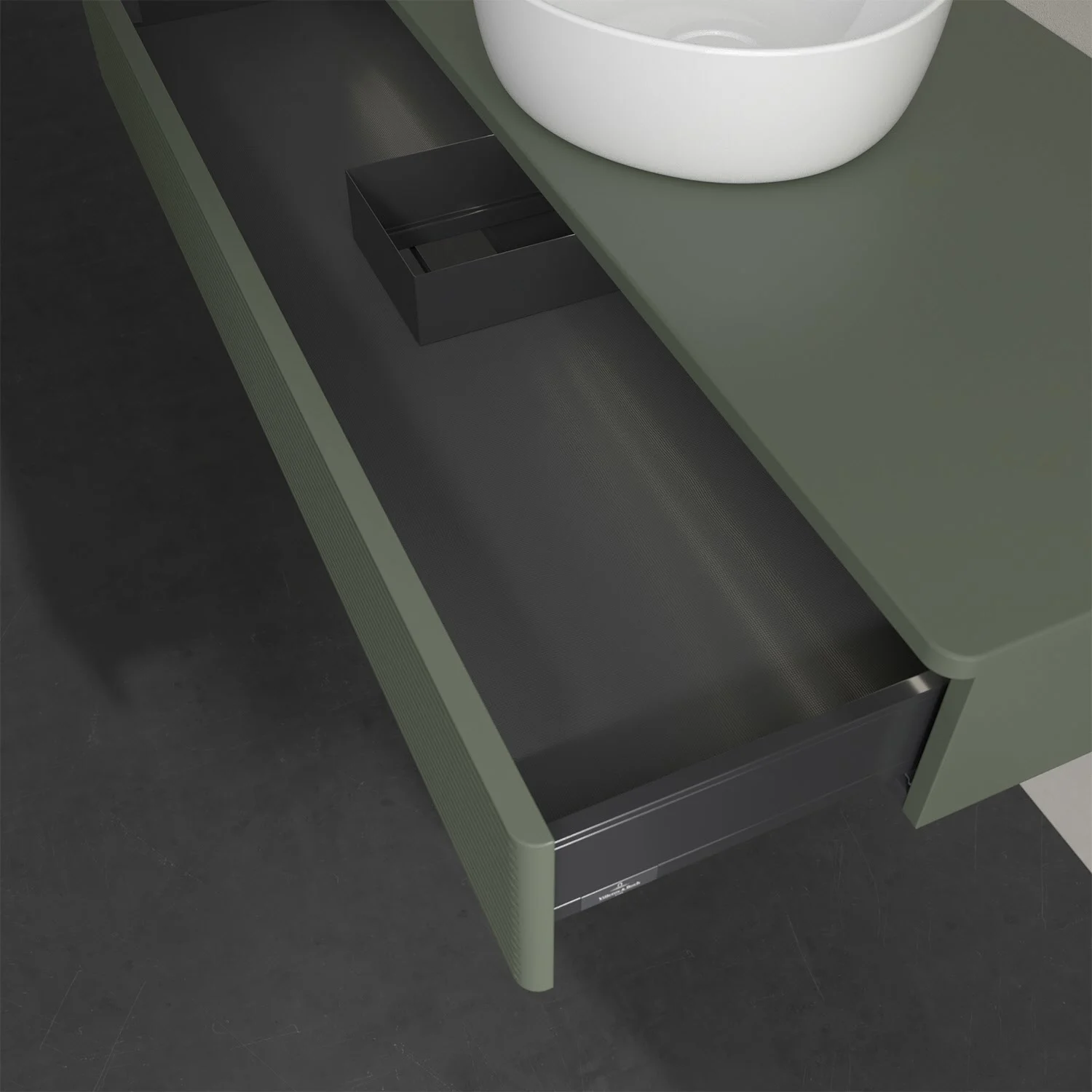 Otwarta szuflada pod zieloną umywalką, Villeroy & Boch