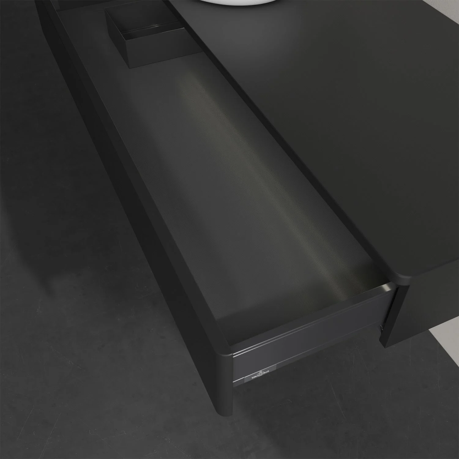 Otwarta szuflada pod czarnym blatem w łazience, Villeroy & Boch