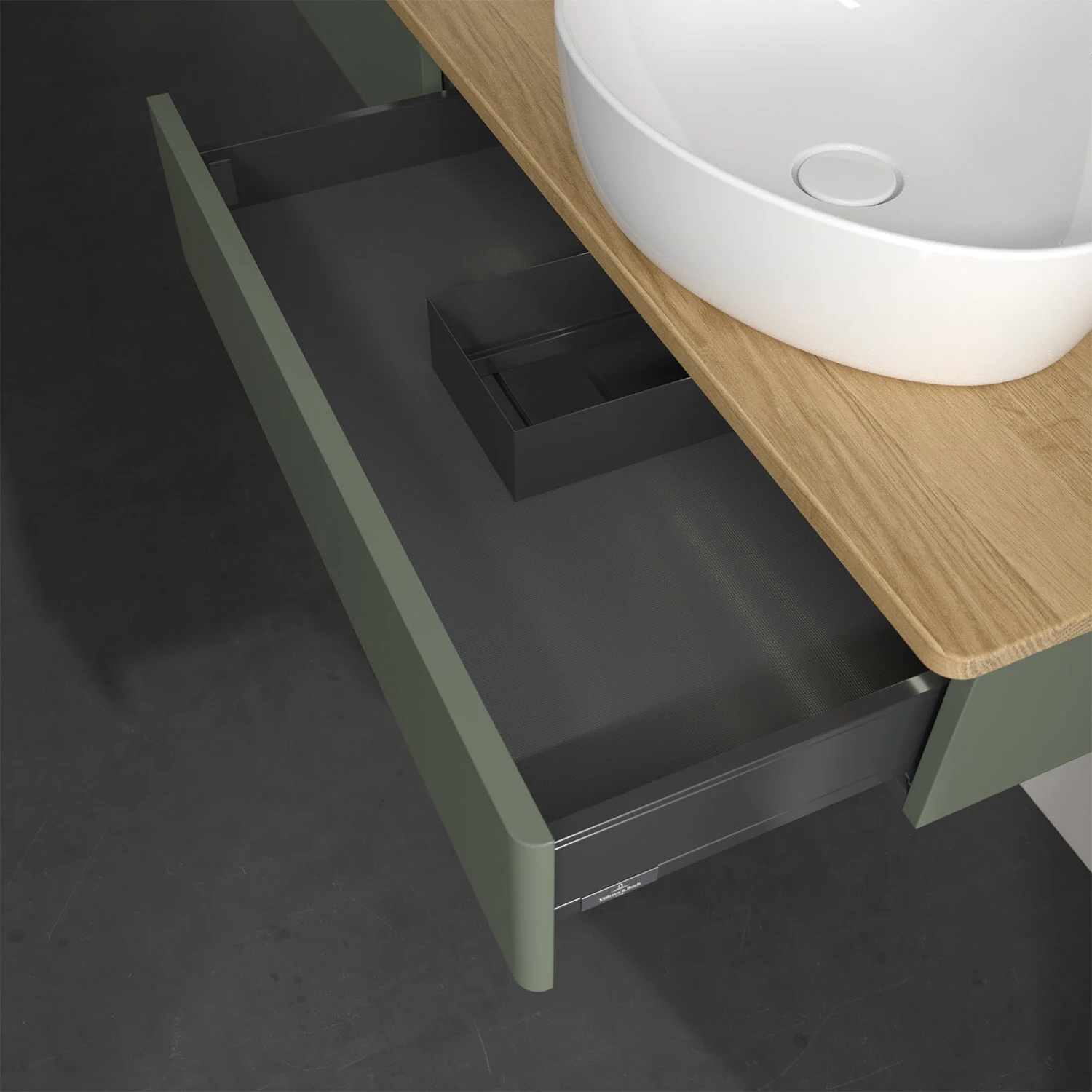 Zbliżenie otwartej zielonej szafki z szufladami w łazience, Villeroy & Boch