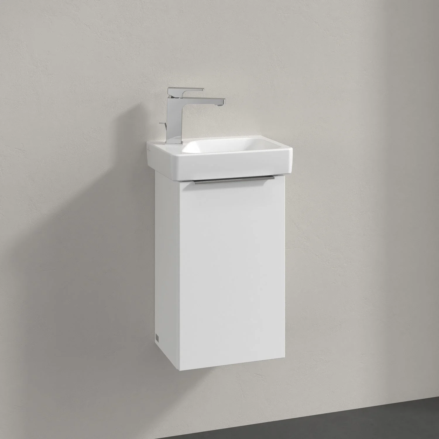 Umywalka z białą szafką na ścianie, Villeroy & Boch