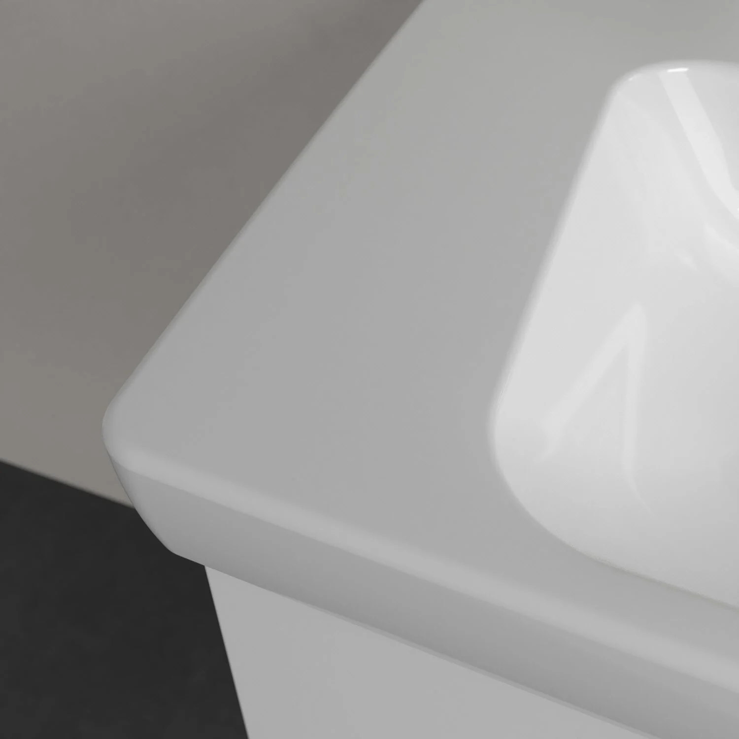 Zbliżenie narożnika białej umywalki, Villeroy & Boch