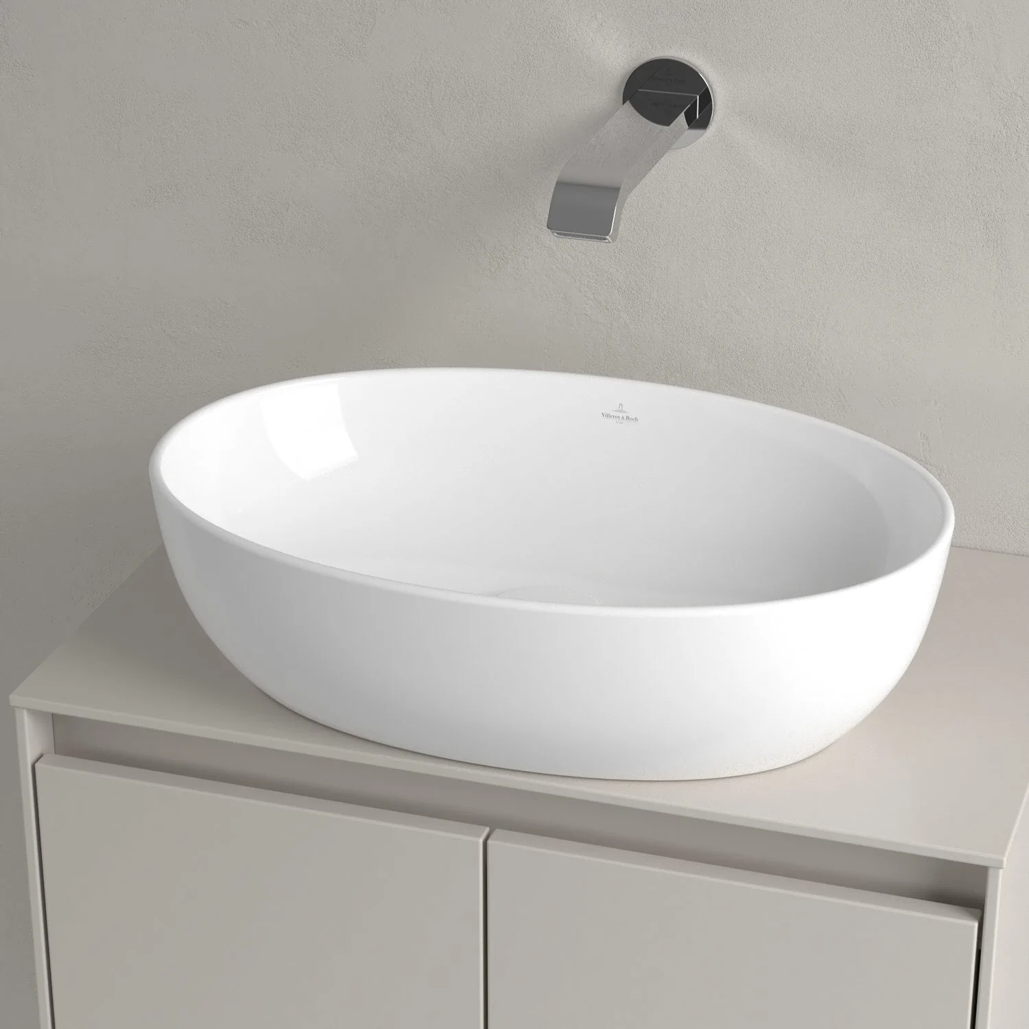 Owalna biała umywalka na szarej szafce, Villeroy & Boch