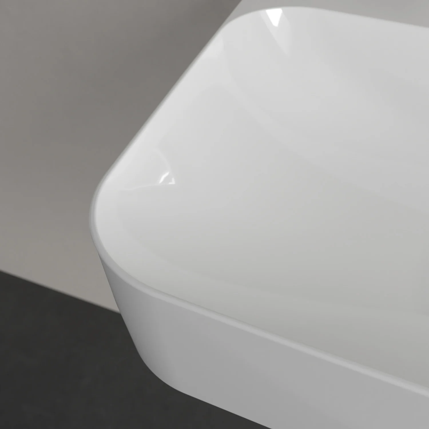 Zbliżenie narożnika białej umywalki, Villeroy & Boch
