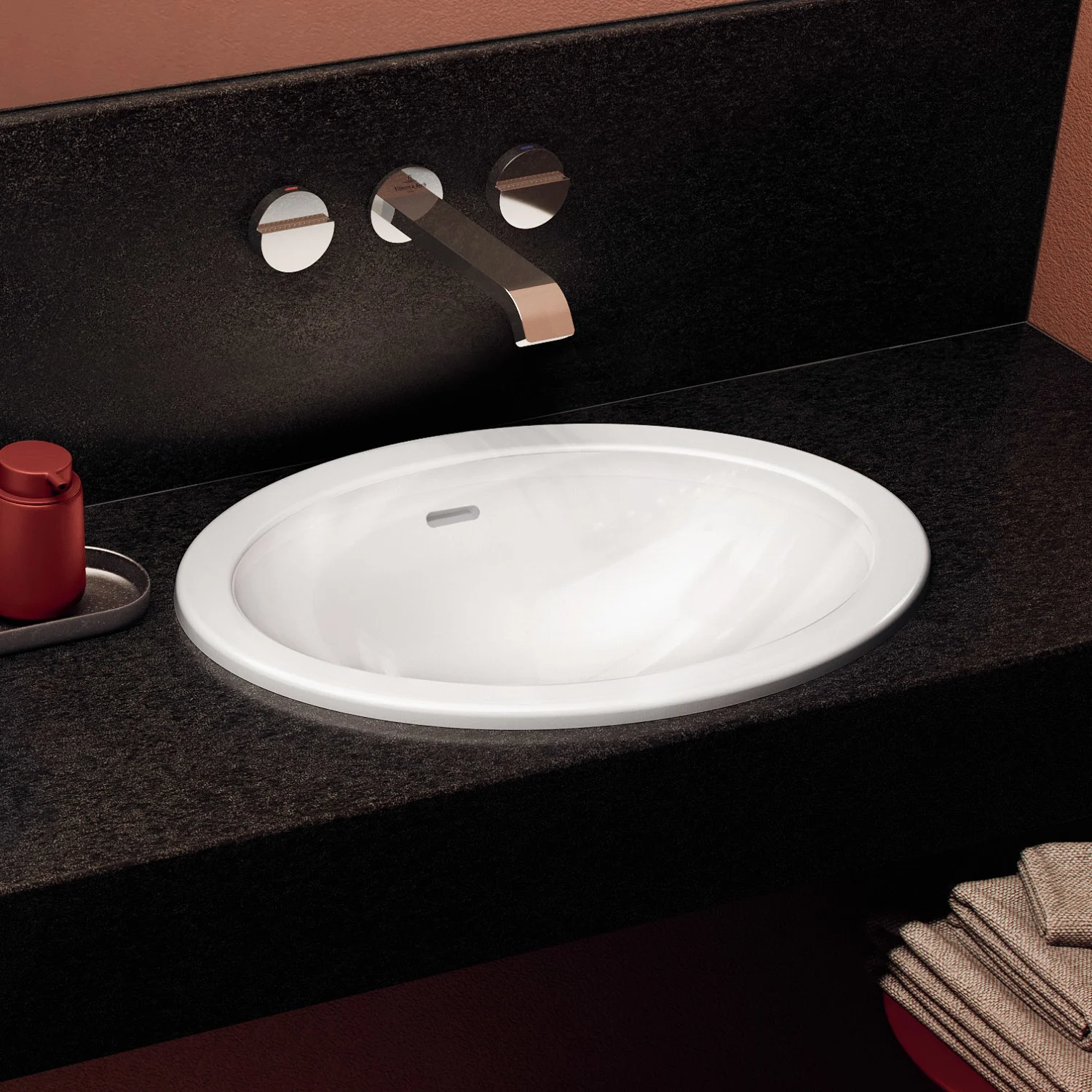 Biała umywalka zamontowana w czarnym blacie, Villeroy & Boch
