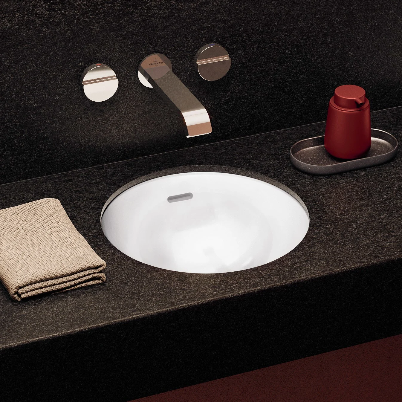 Okrągły zlew wbudowany w czarny blat, Villeroy & Boch