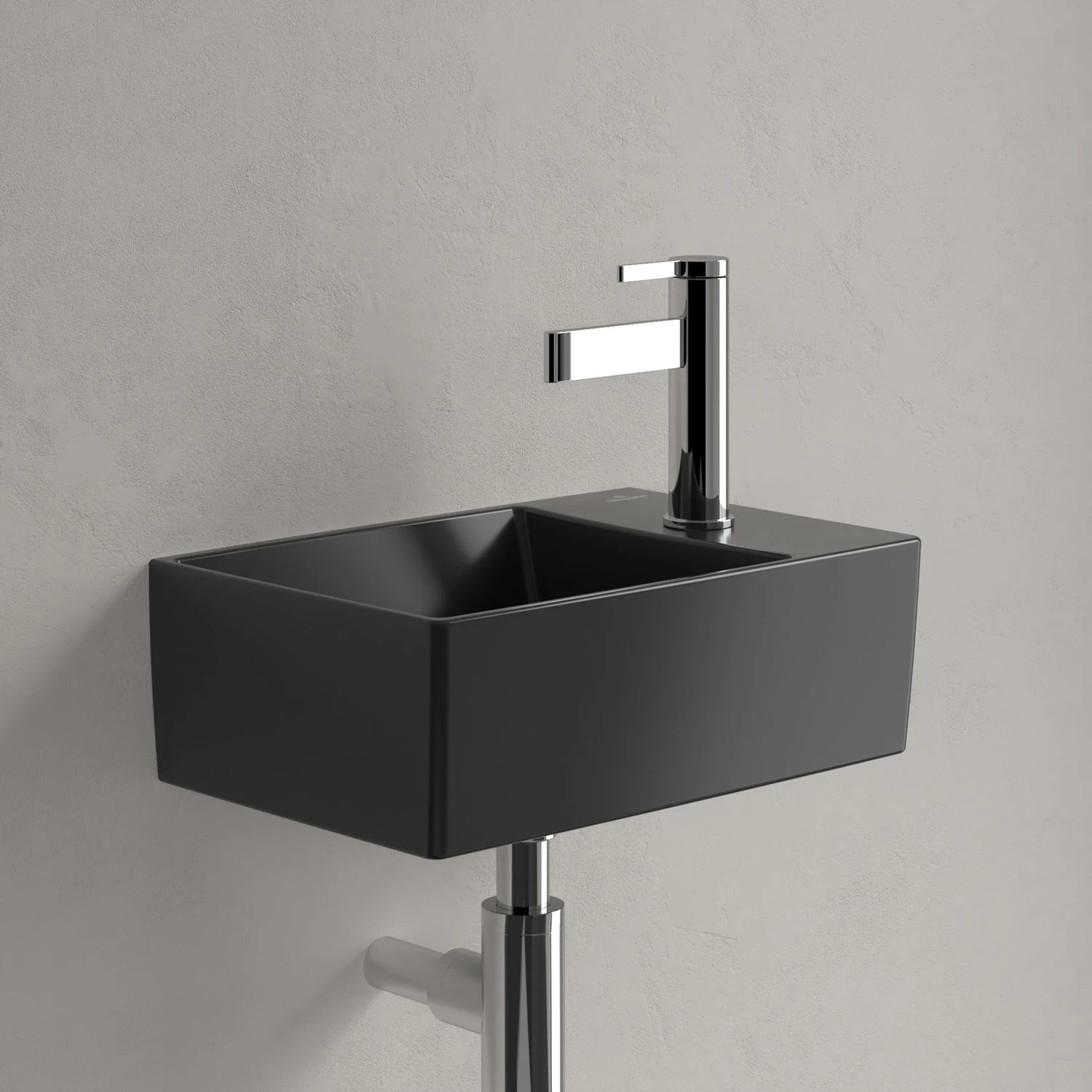 Mała czarna umywalka z baterią w łazience, Villeroy & Boch