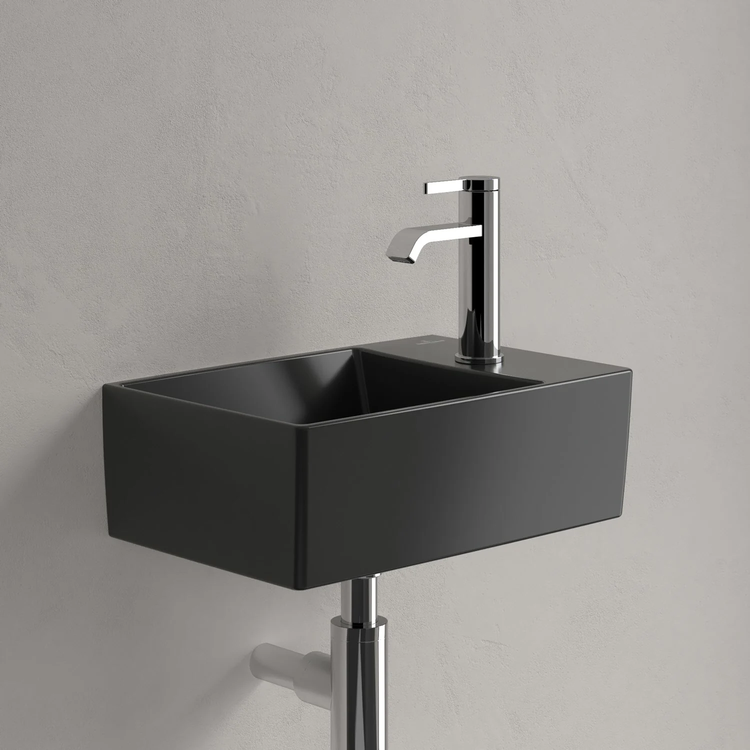 Mała czarna umywalka z baterią w łazience, Villeroy & Boch