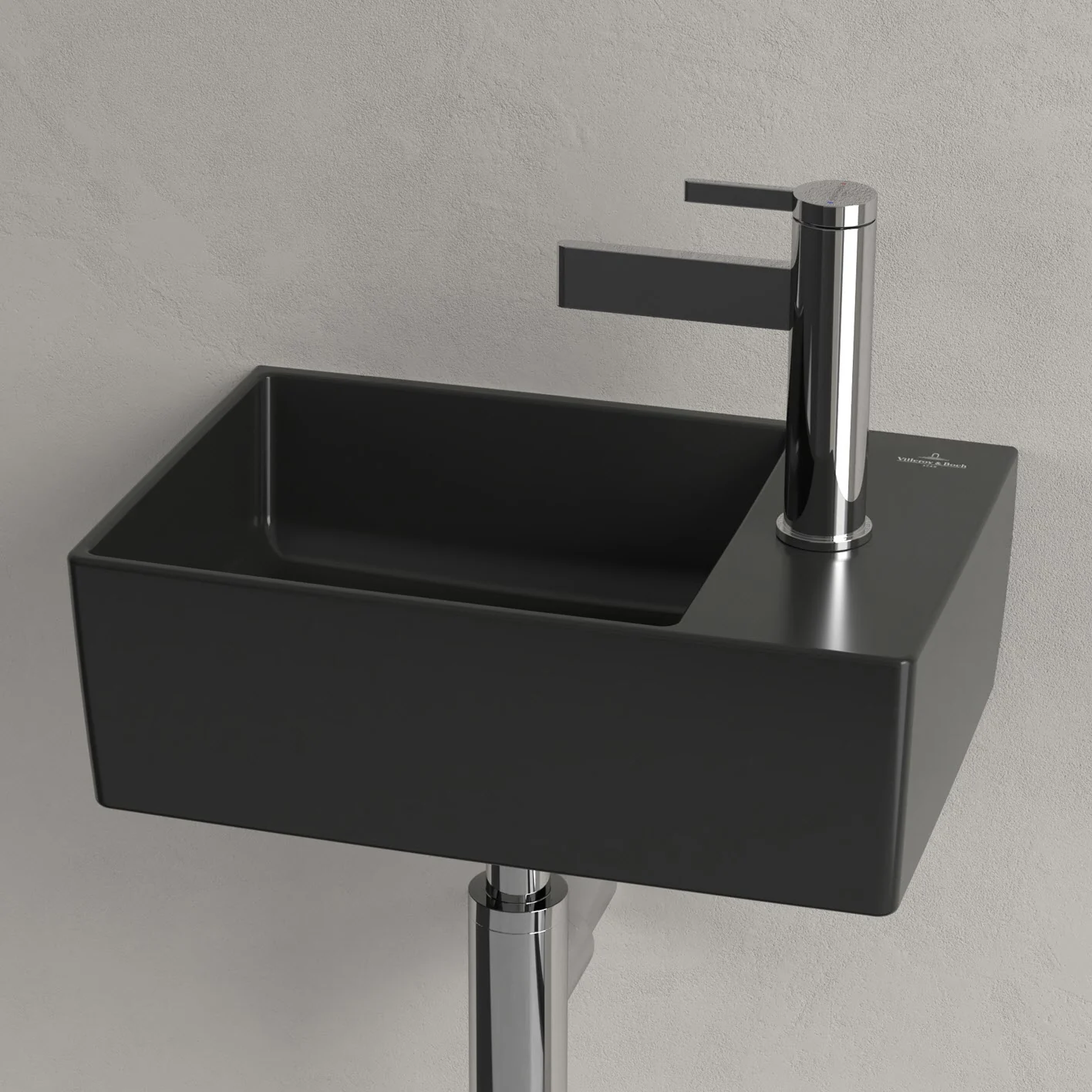 Czarna umywalka z baterią w zbliżeniu, Villeroy & Boch
