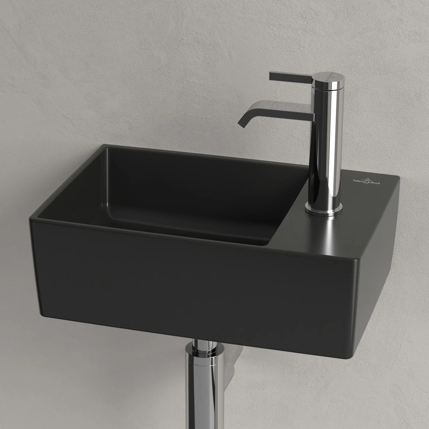 Czarna umywalka z baterią w zbliżeniu, Villeroy & Boch