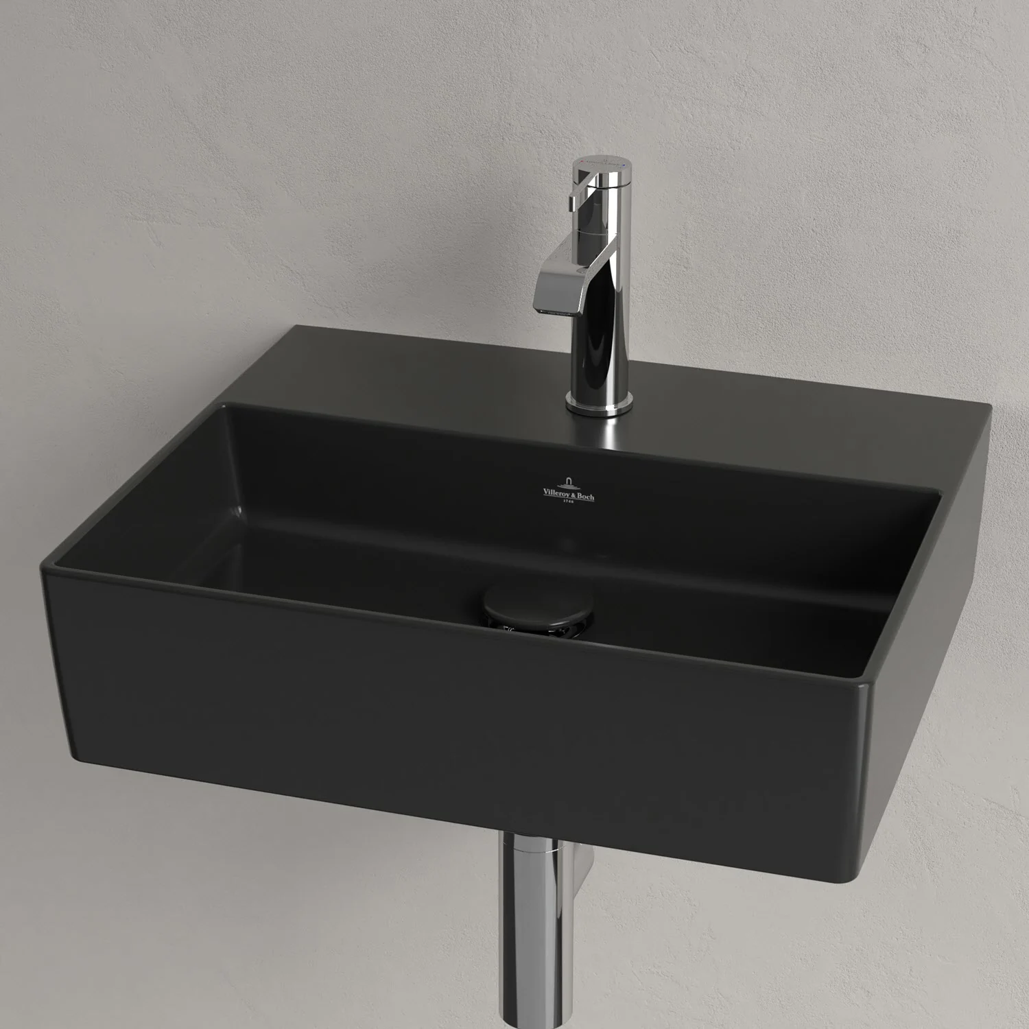 Czarna umywalka z jednouchwytową baterią z bliska, Villeroy & Boch