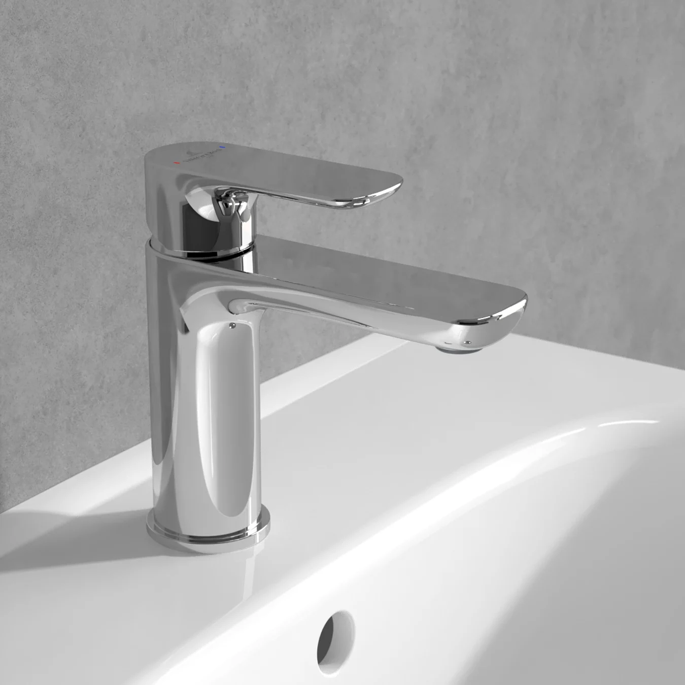 Chromowana bateria na umywalce przy szarej ścianie, Villeroy & Boch