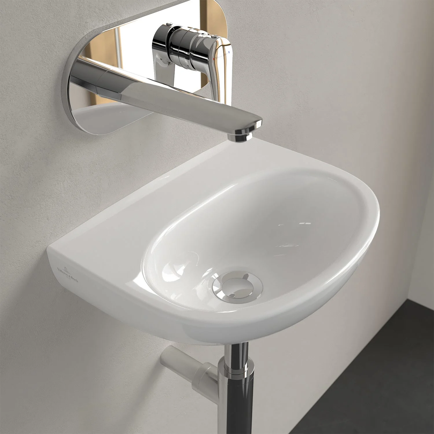 Biała umywalka z baterią ścienną w zbliżeniu, Villeroy & Boch