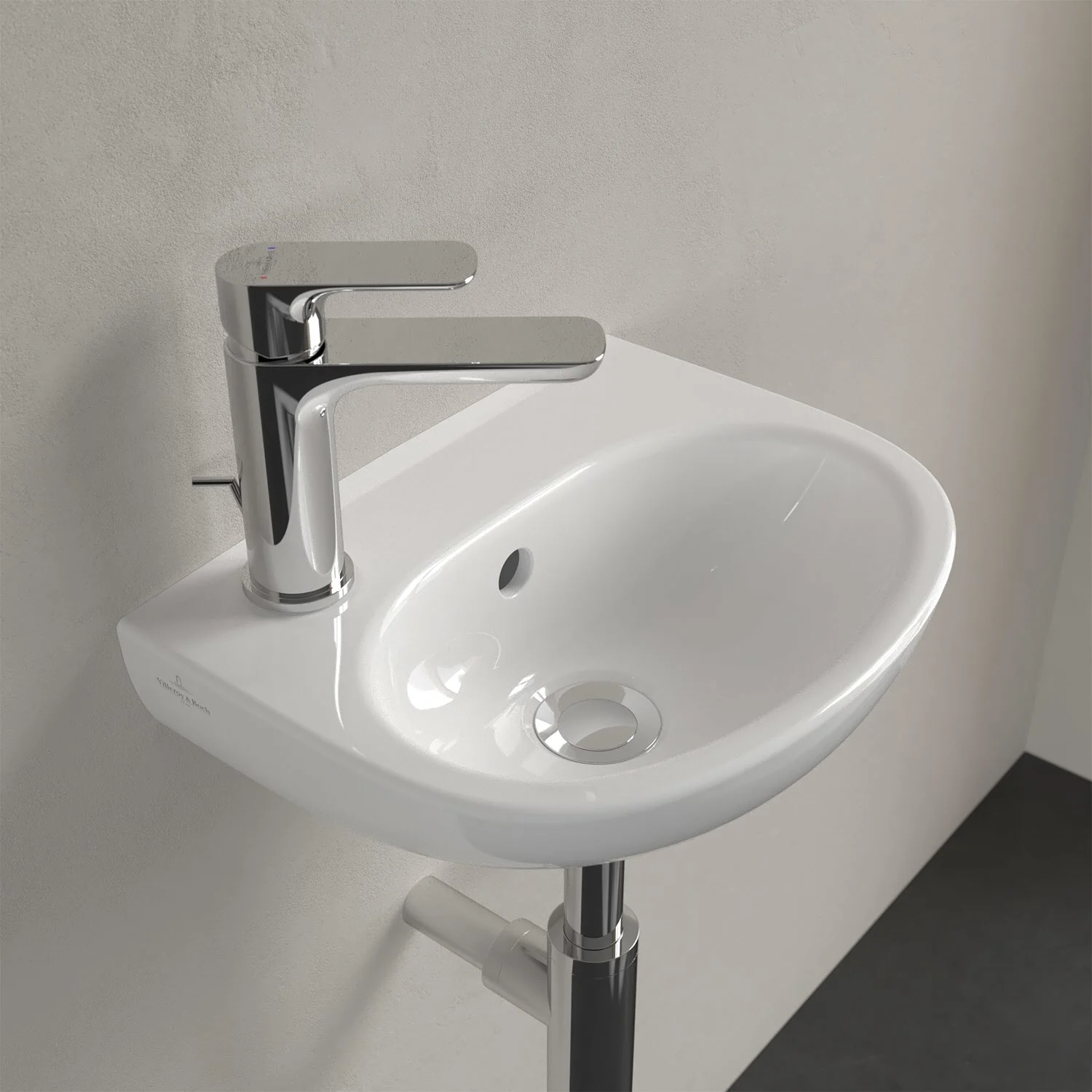 Biała umywalka z baterią w zbliżeniu, Villeroy & Boch