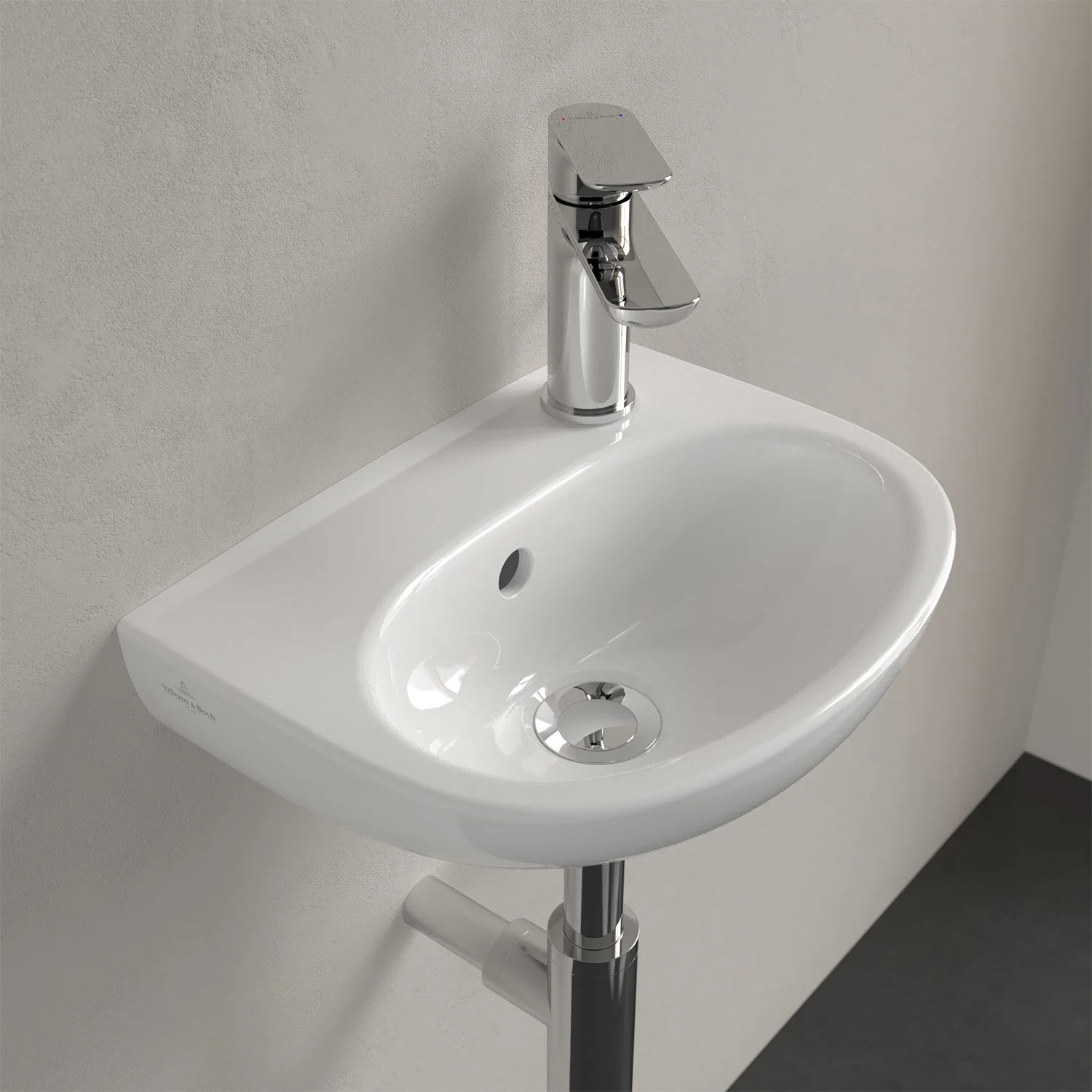 Biała umywalka z baterią w zbliżeniu, Villeroy & Boch