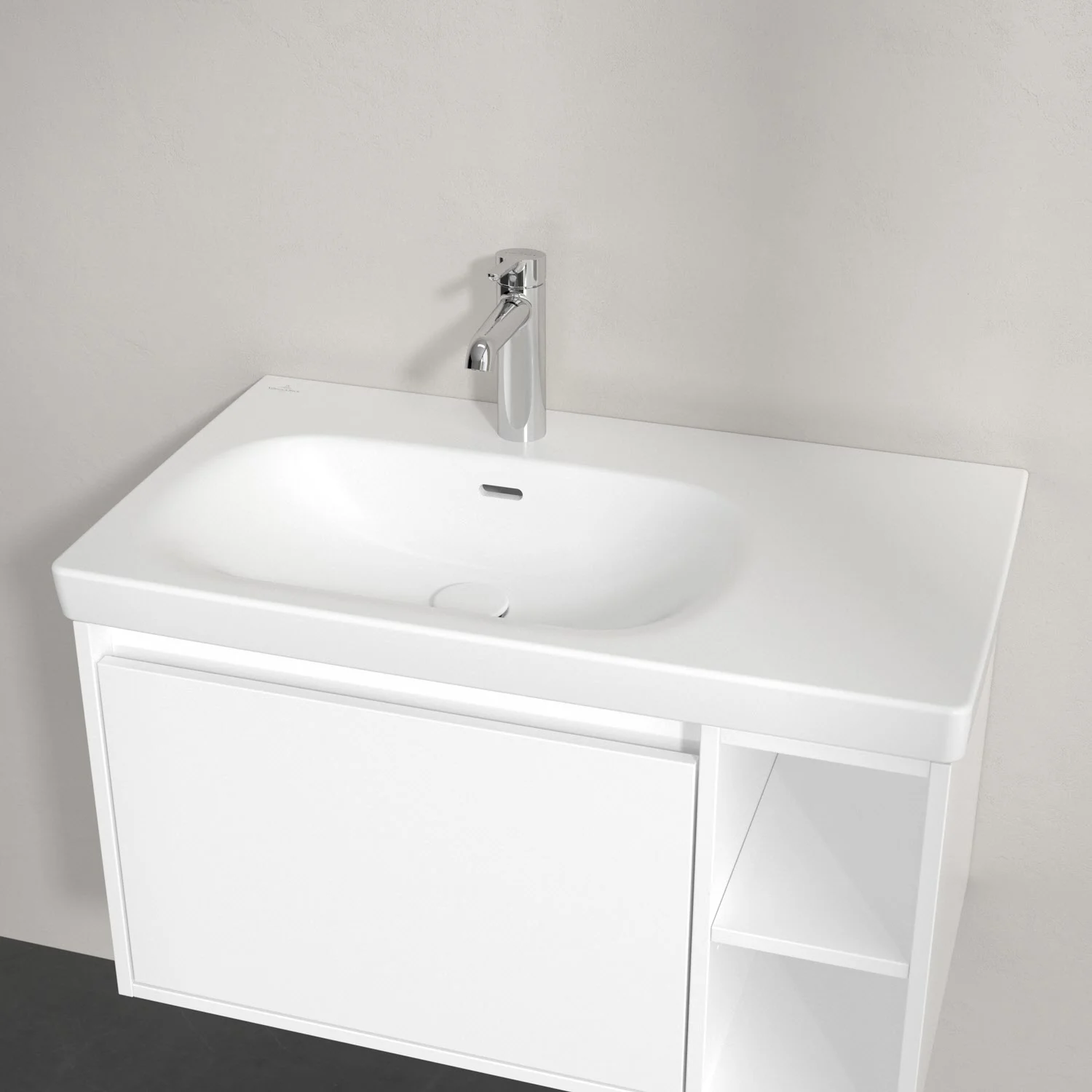 Biała umywalka z jednouchwytową baterią z bliska, Villeroy & Boch