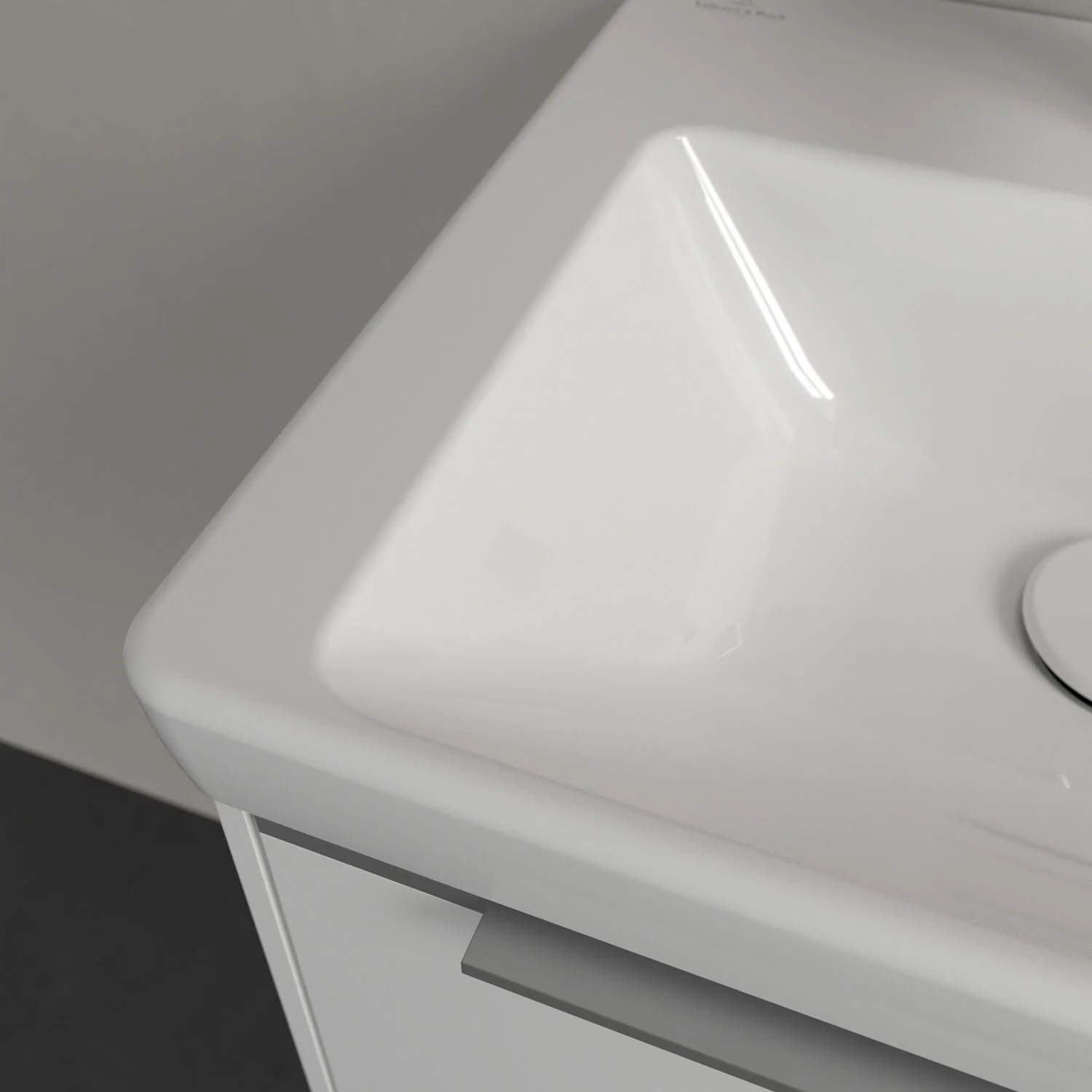 Zbliżenie białej umywalki z szafką, Villeroy & Boch