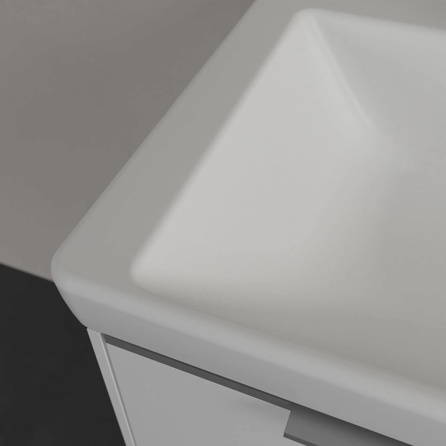 Zbliżenie narożnika białej umywalki, Villeroy & Boch
