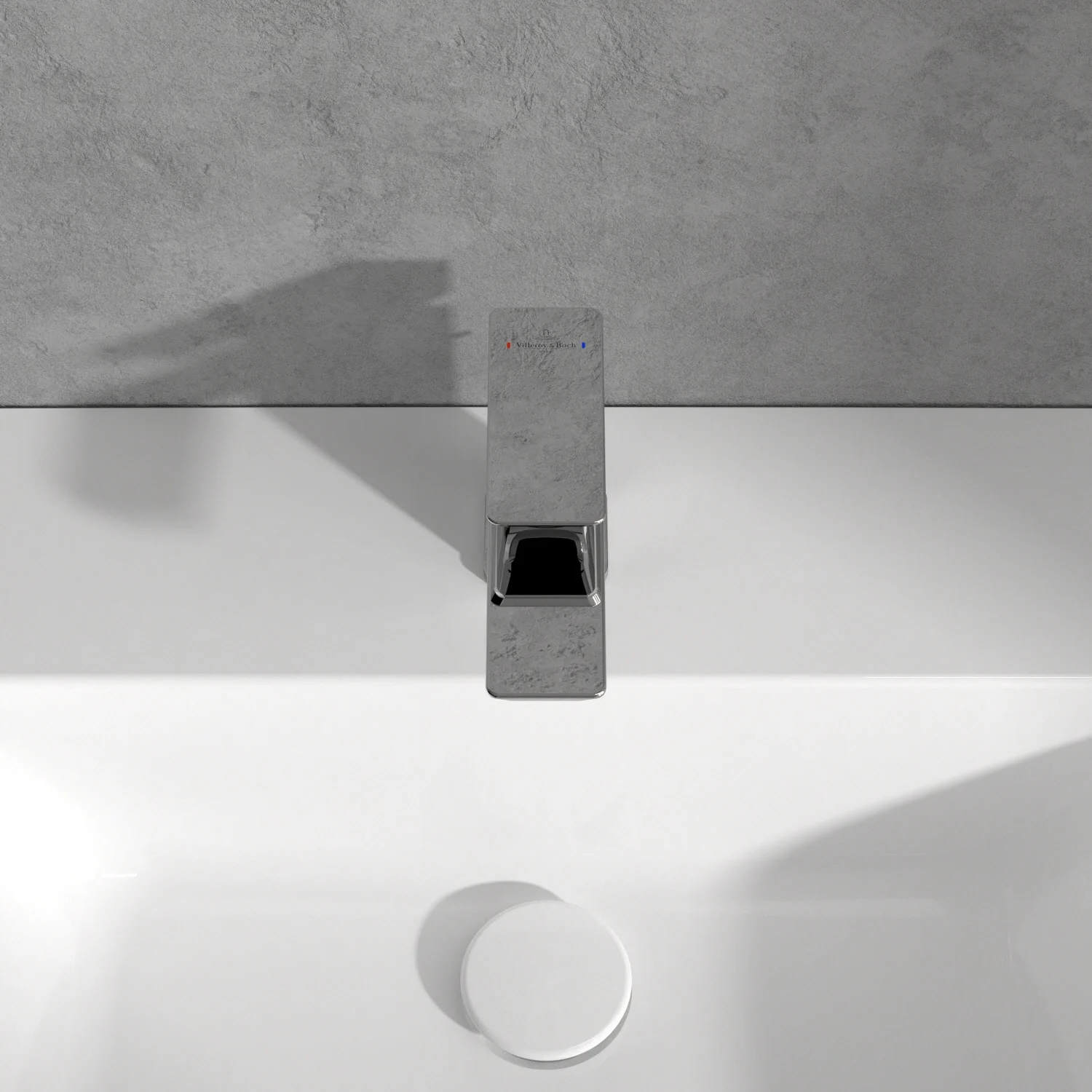 Chromowana bateria na białej umywalce z góry, Villeroy & Boch