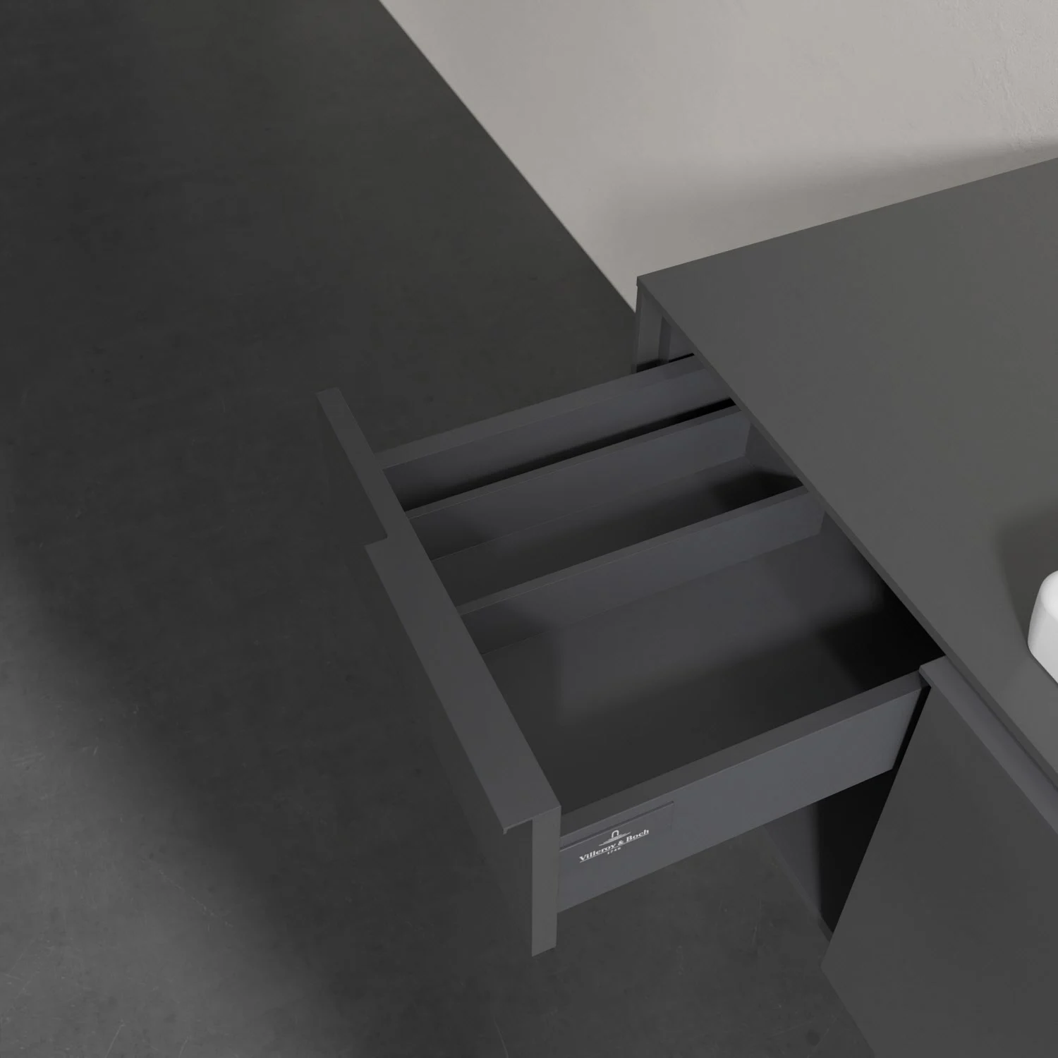 Zbliżenie szarej toaletki z otwartą szufladą, Villeroy & Boch