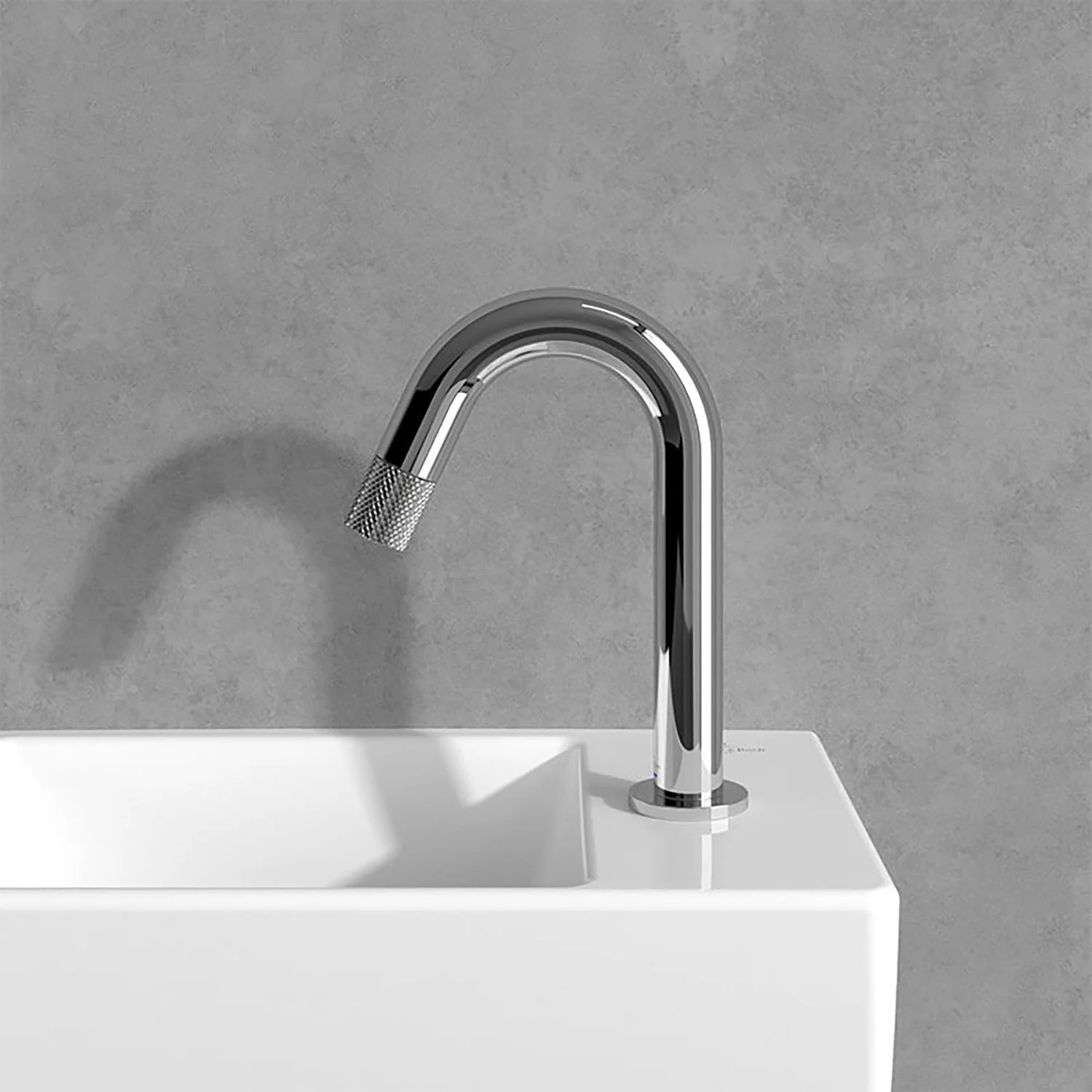 Chromowana bateria na białej umywalce, Villeroy & Boch