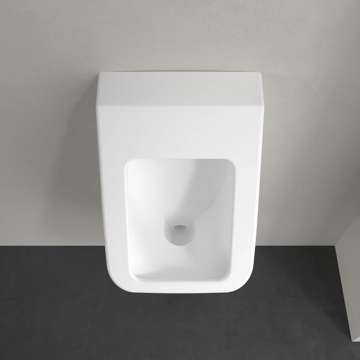 Białe pisuar zbliżenie na ścianie, Villeroy & Boch