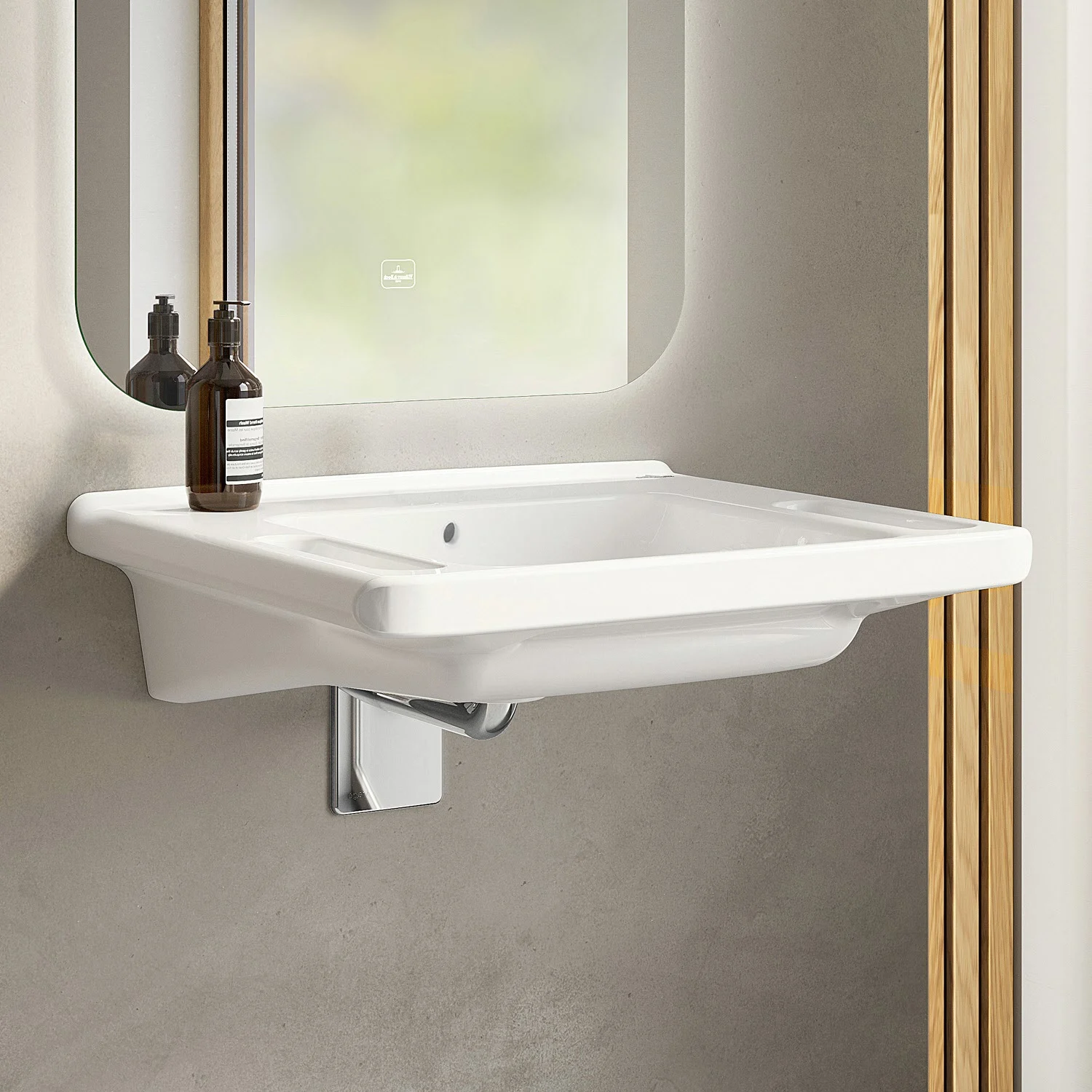 Zbliżenie białej umywalki z lustrem, Villeroy & Boch