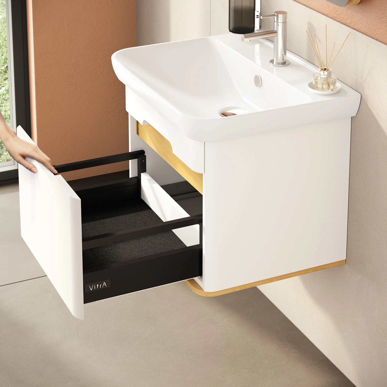 Biała umywalka z otwartą szufladą w łazience, Vitra