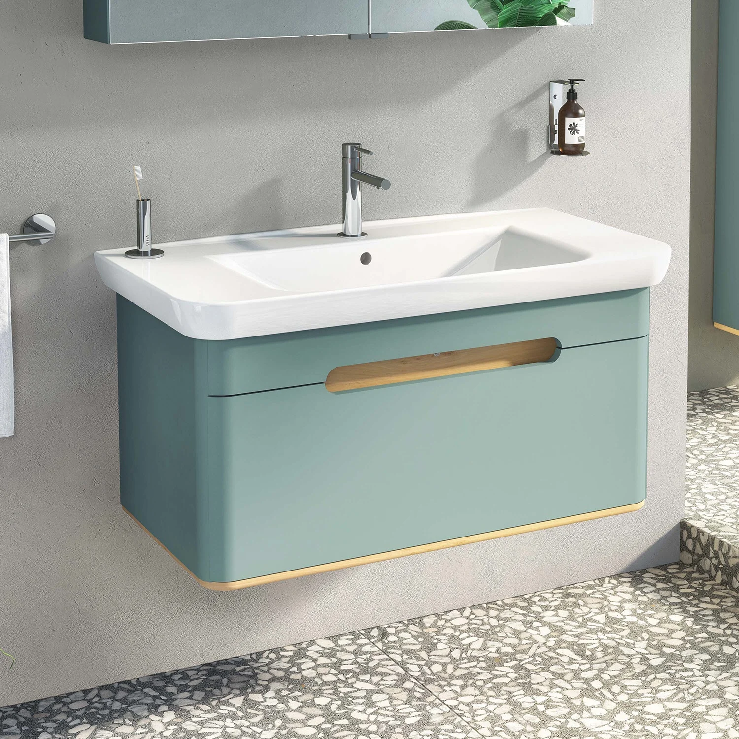 Umywalka z zieloną szafką w łazience, Vitra