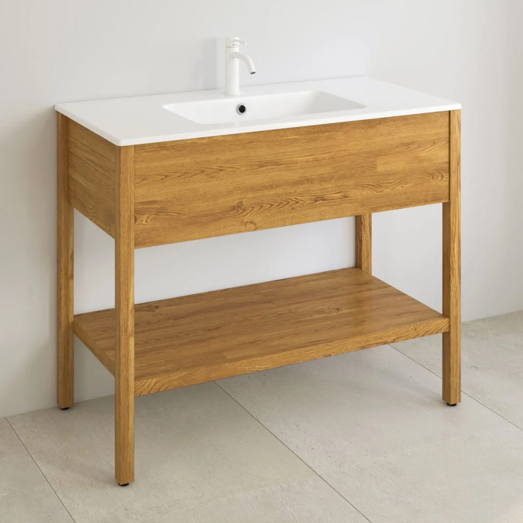 Ein Waschtischunterschrank aus Holz passt zum Landhausstil.