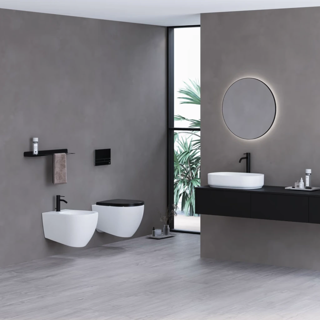 Art Wand-WC spülrandlos in einem modernen, grauen Bad in Betonoptik