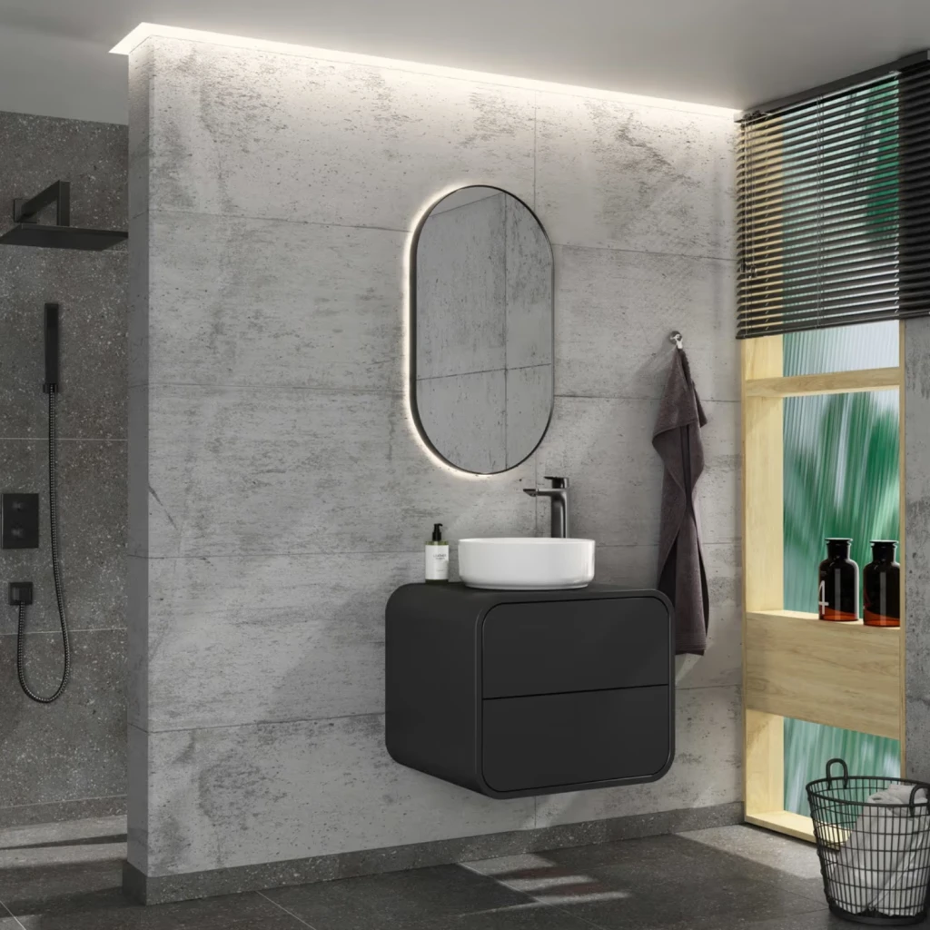 Pure Arc Waschtischunterschrank in schwarz matt unter natürlichem Lichteinfluss.