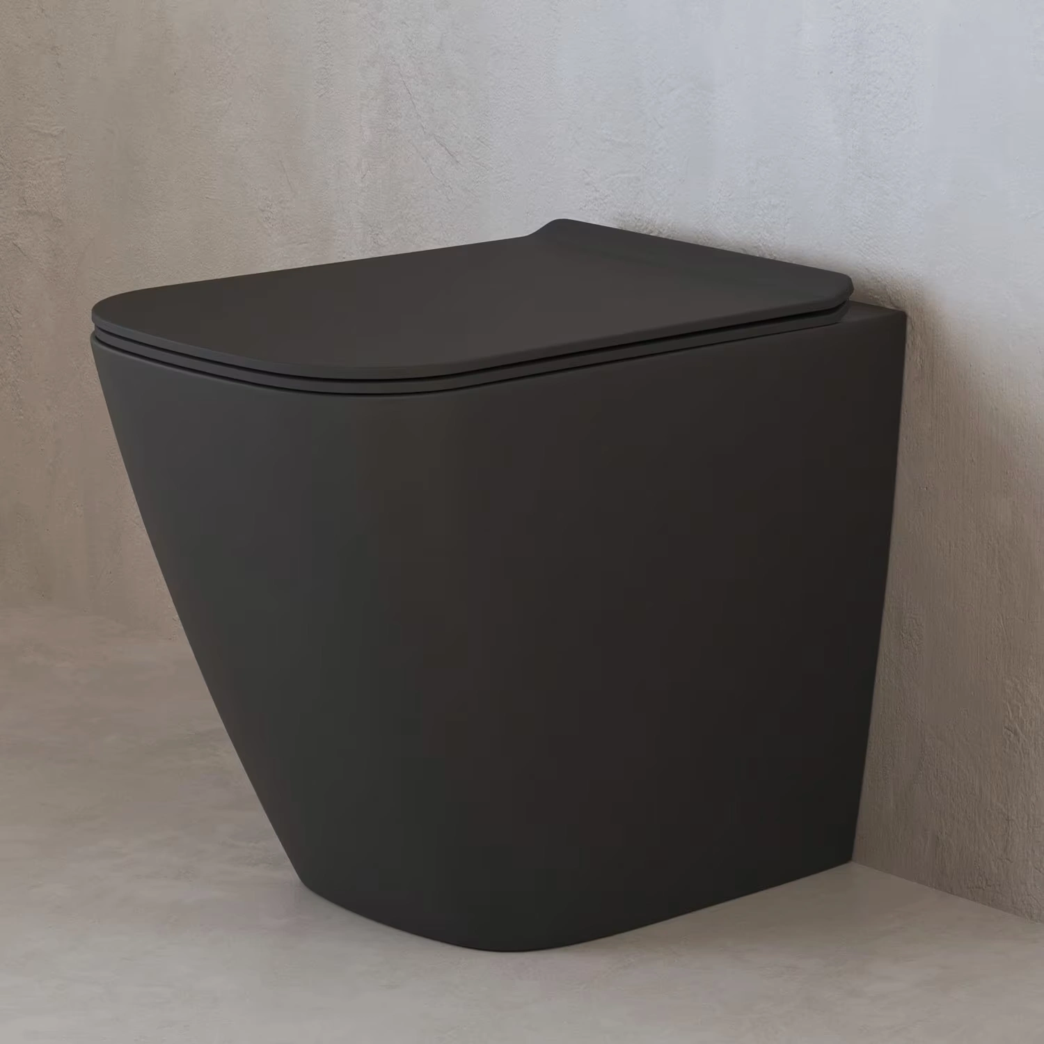 Nero mattes wandbündiges Stand-WC von ALLUVION in einem beigen Bad
