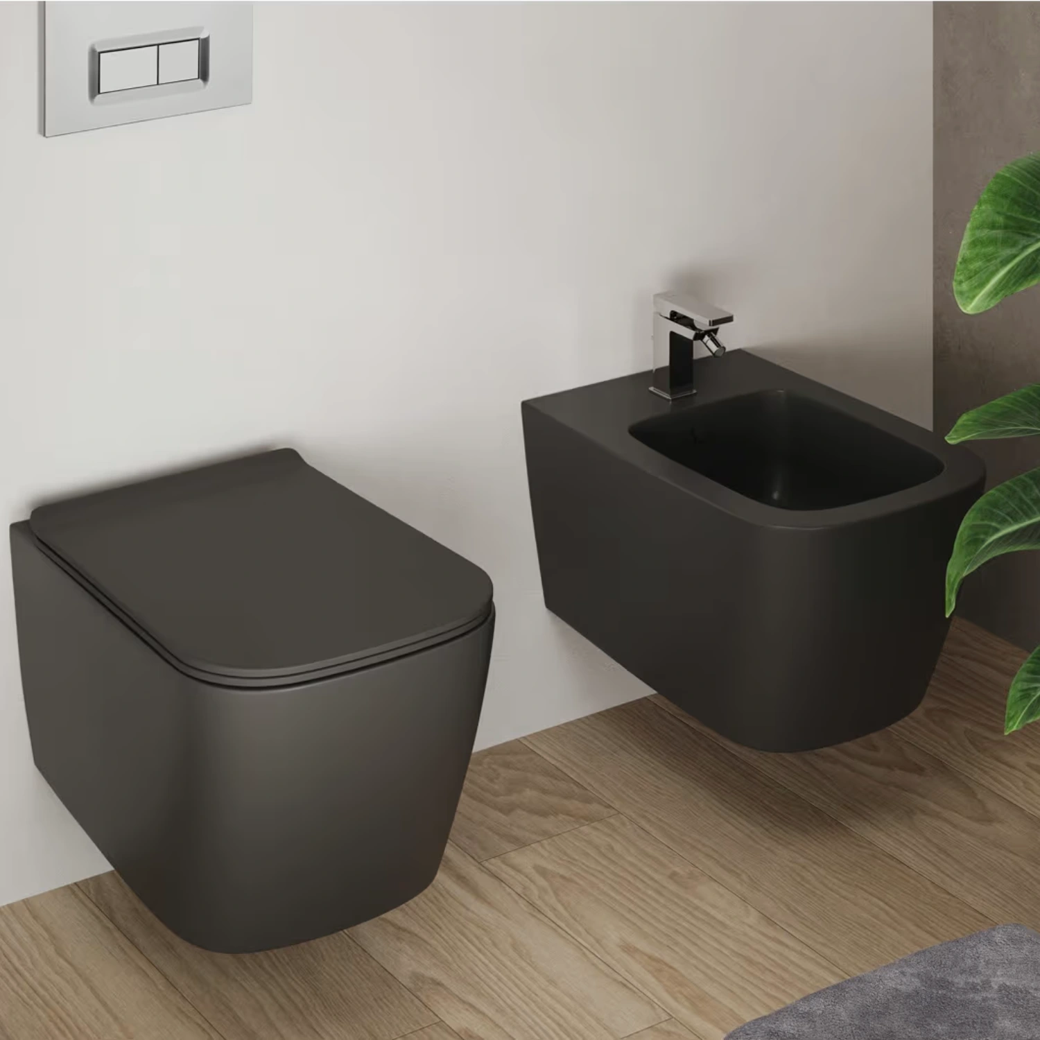 Schwarzes Wand-WC und schwarzes Bidet in modernem Badezimmer