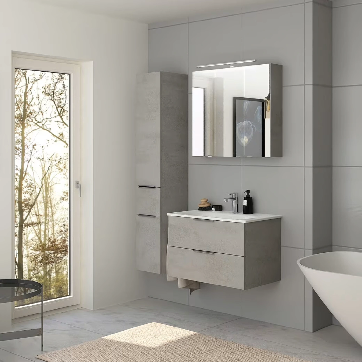 Steinkamp Living 2.0 in einem modernen, schlicht gehaltenen grauen Badezimmer.